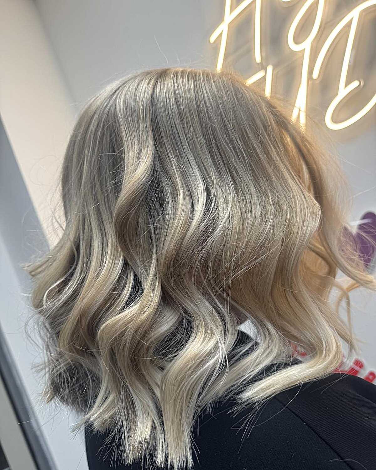 Wavy textured bob in smoky ash Scandinavian blonde