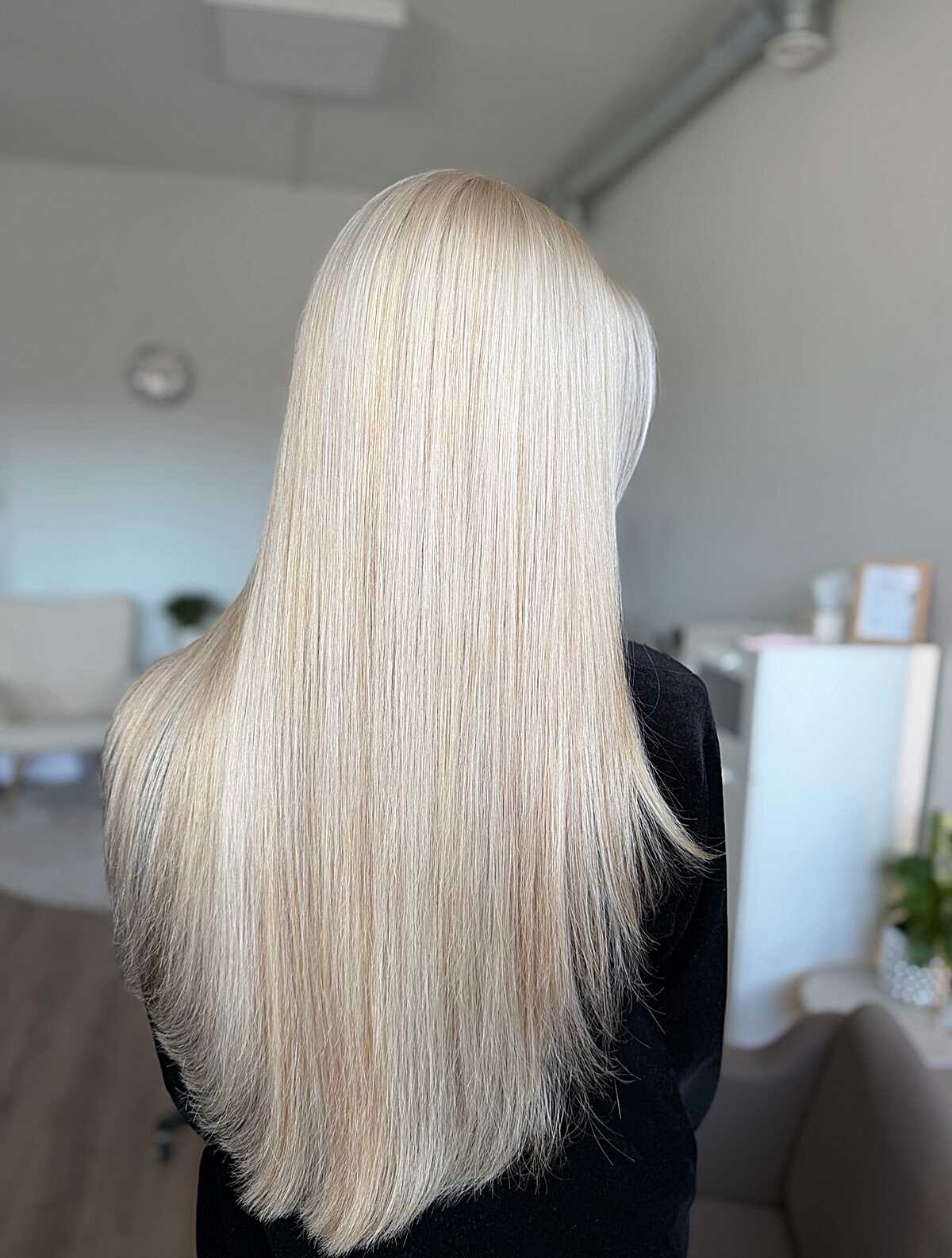 Very long straight platinum Scandinavian blonde silk finish