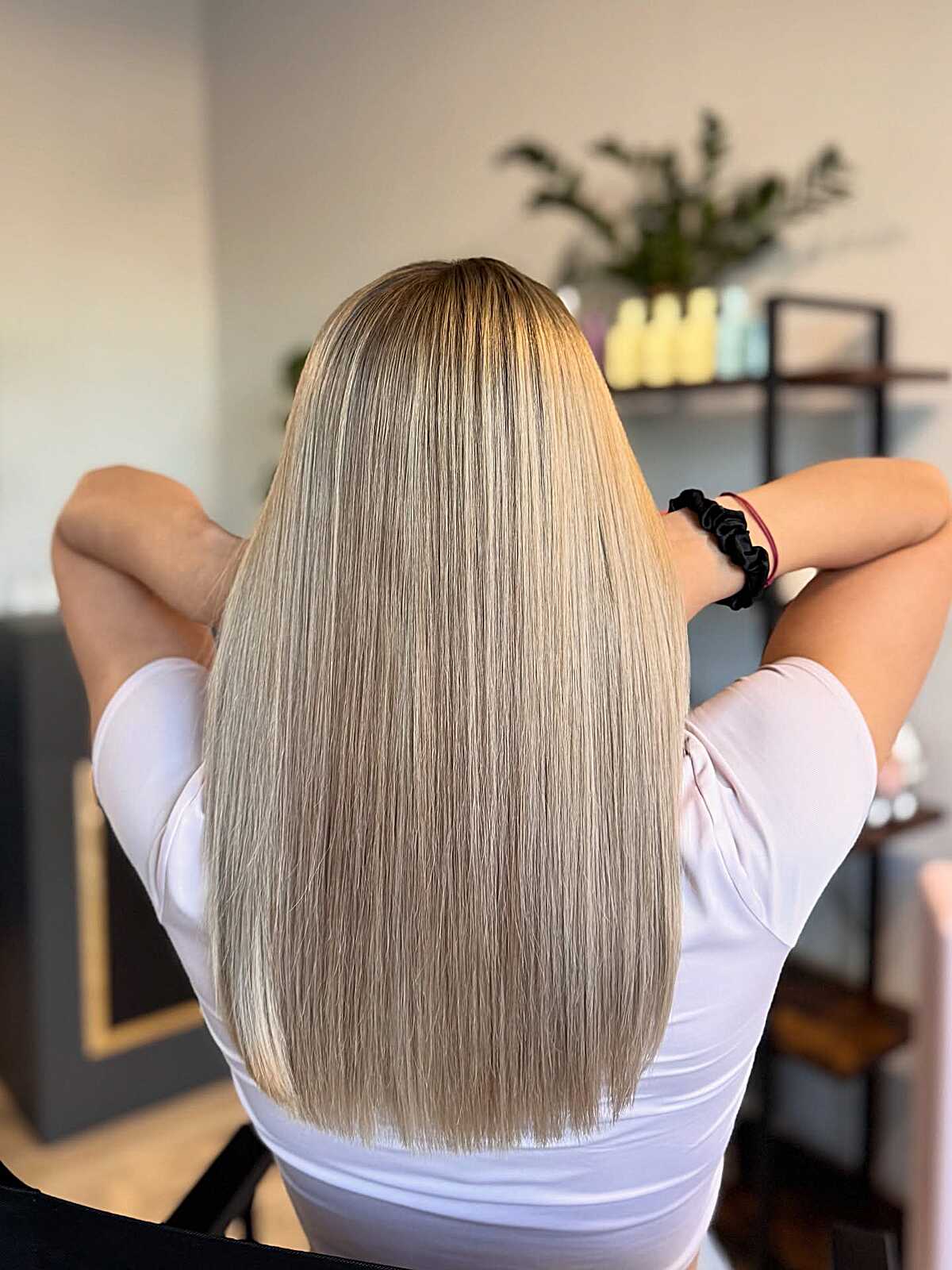 Long straight dark Scandinavian blonde with glass-like shine