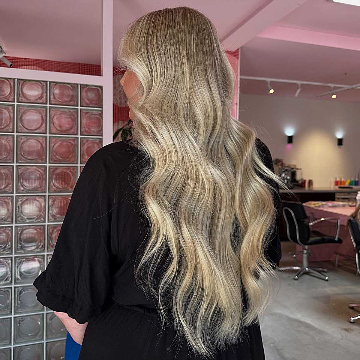 Very long icy Scandinavian blonde with loose waves