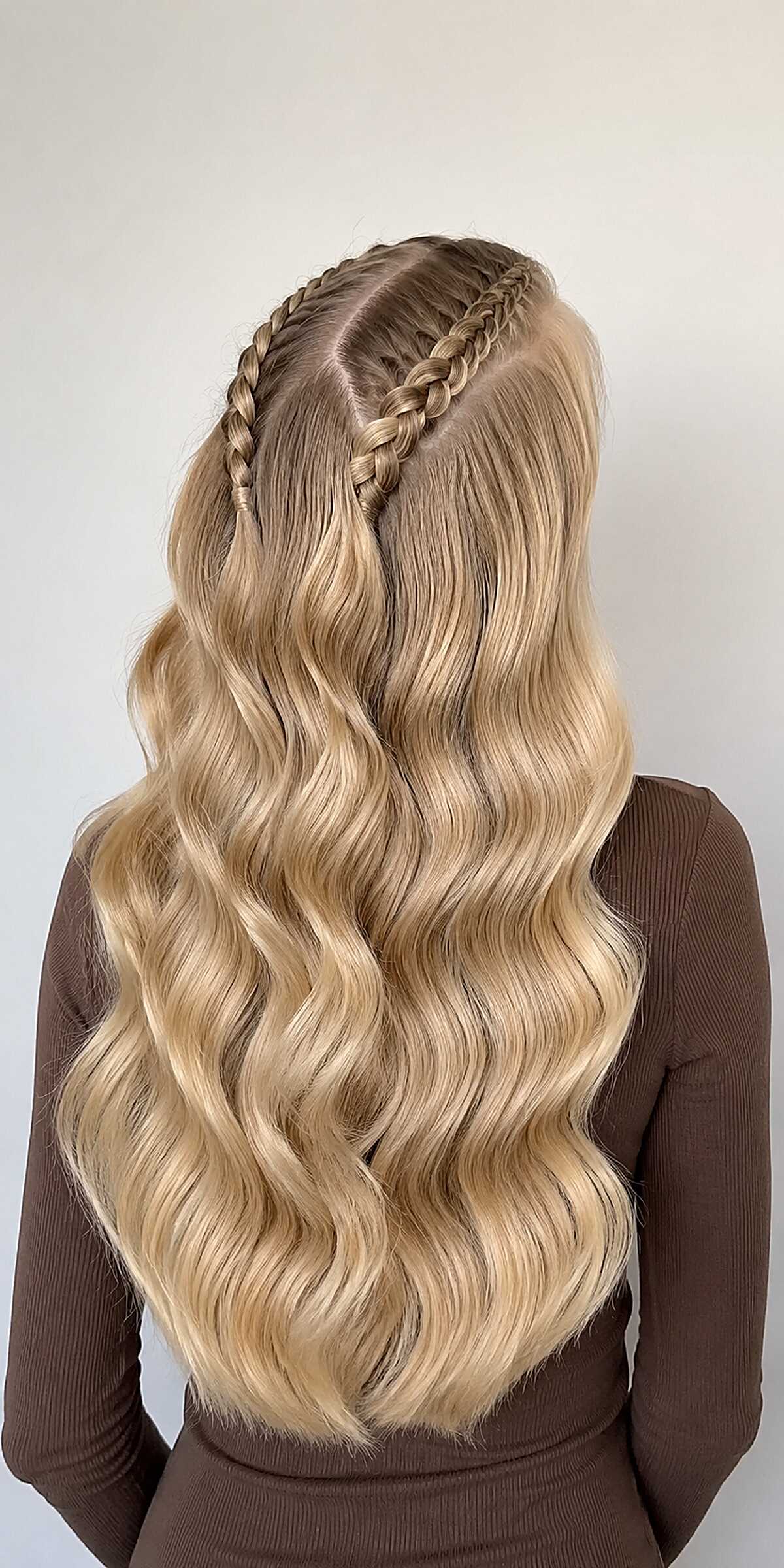 Center-Part Dutch Braid Crown on Long Blonde Balayage Waves
