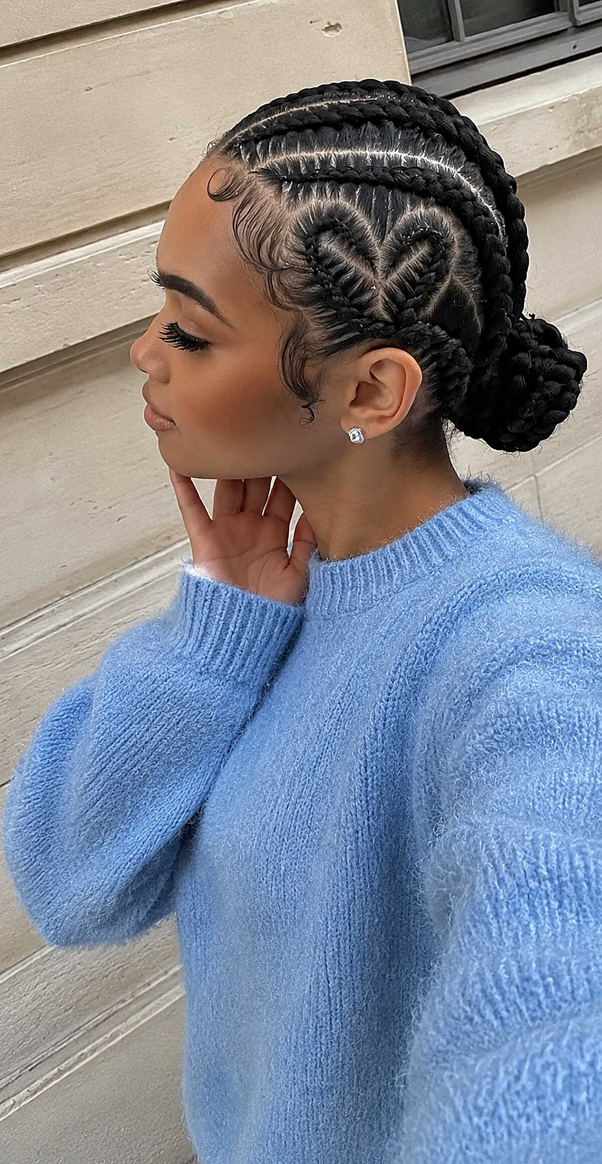 Heart-Shaped Cornrow Design with a Braided Low Bun