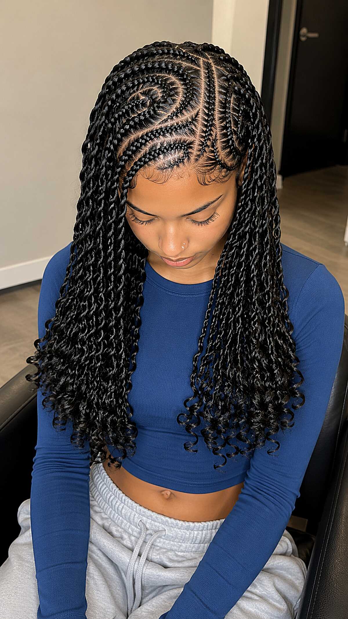 Swirl-Part Cornrows Flowing into Waist-Length Knotless Braids with Curly Ends