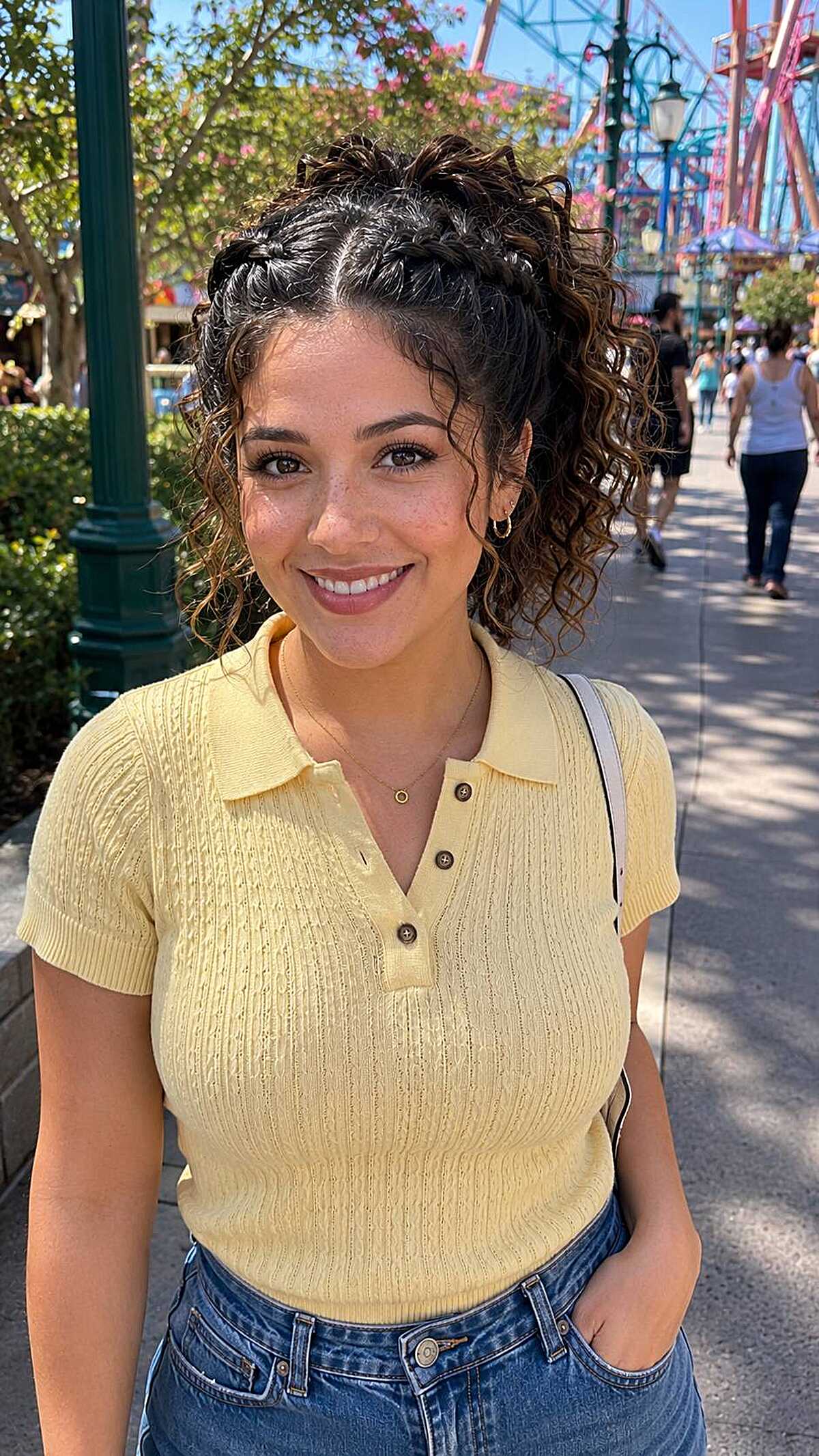 Curly hair in a half-up style with braided crown detail
