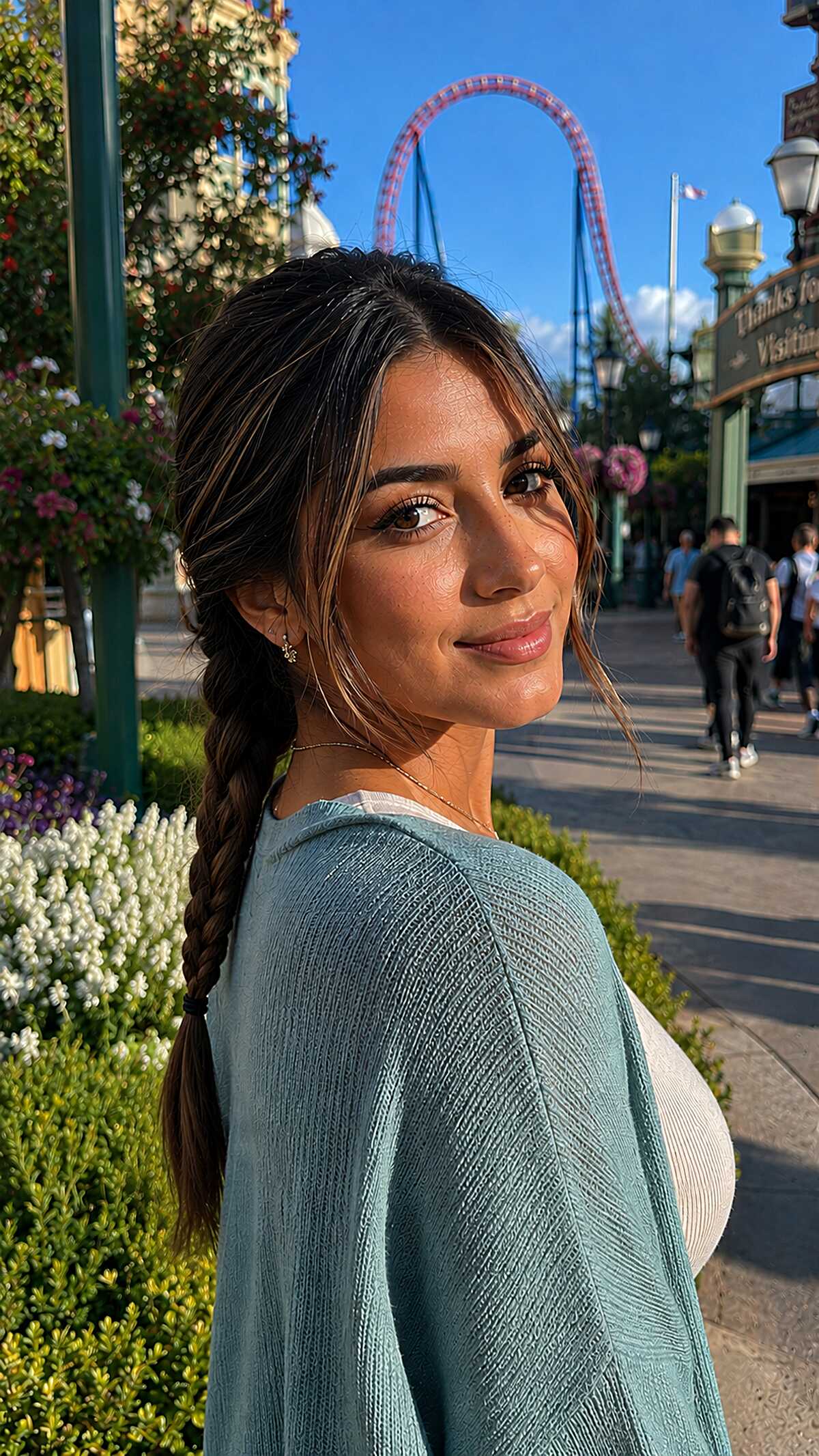 Brunette low braid with loose highlighted face-framing pieces