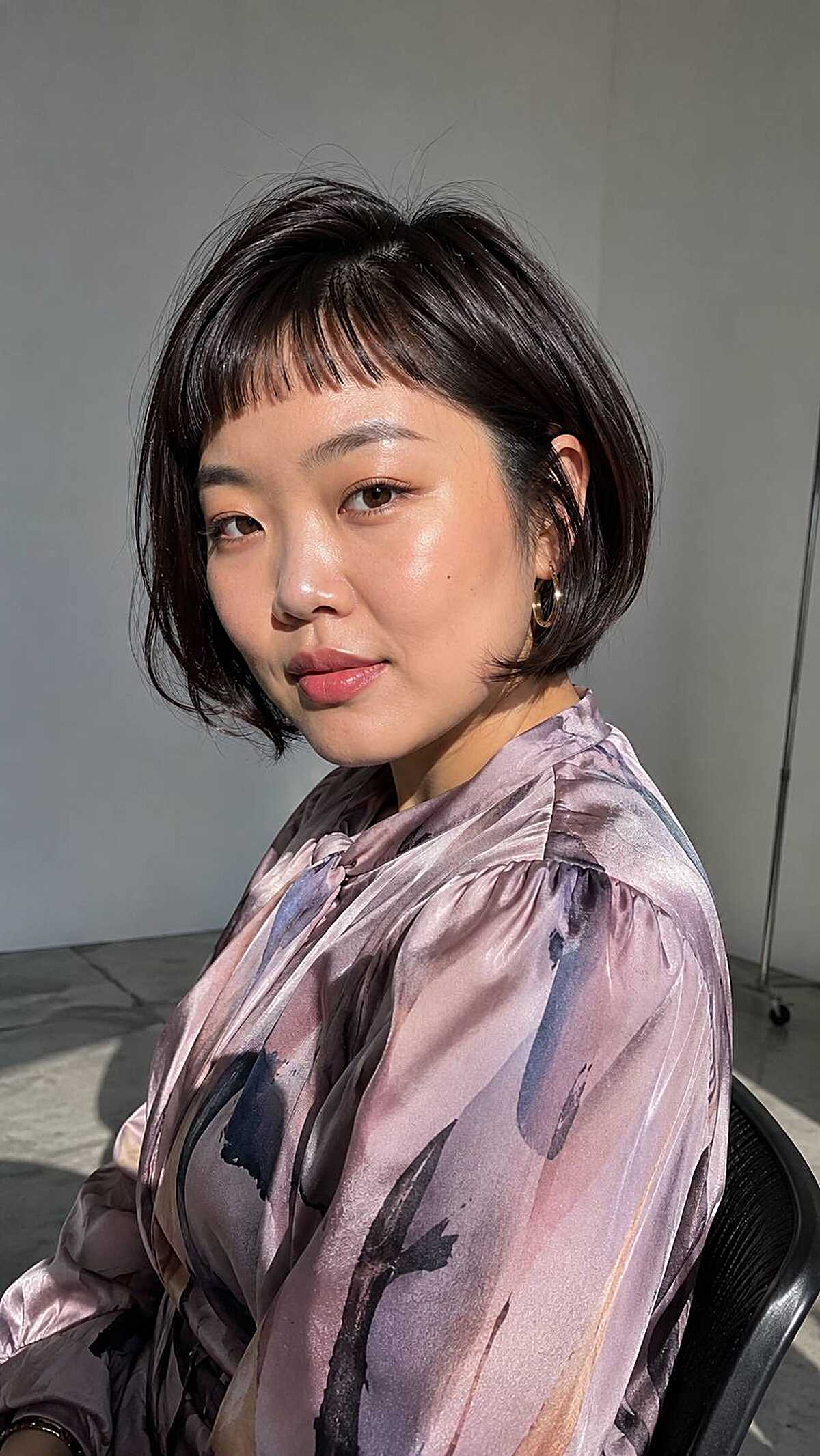Soft micro fringe with textured chin-length bob dark hair