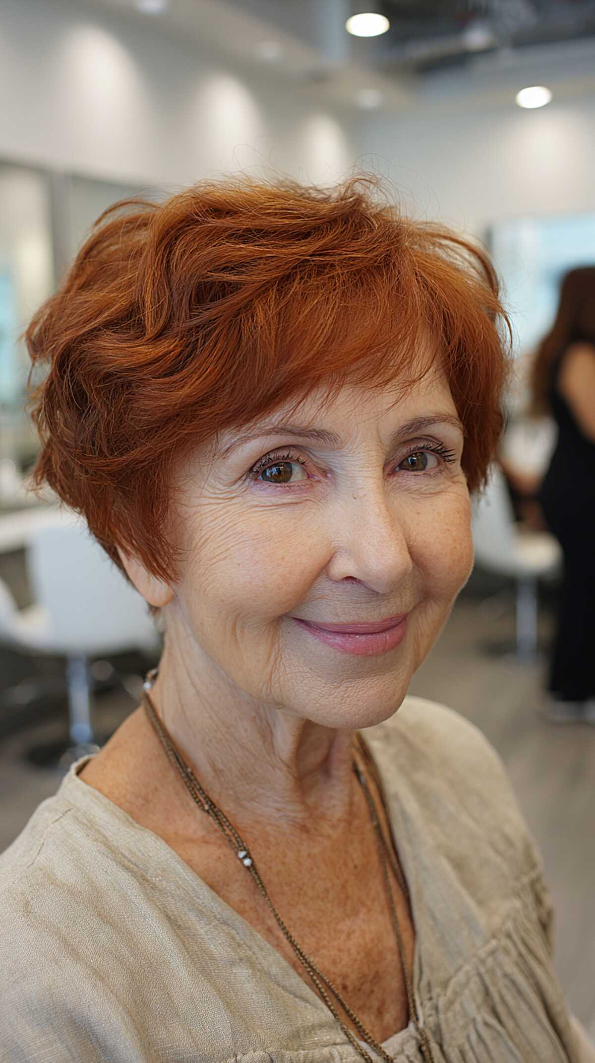 Copper red pixie-shag with tousled top layers
