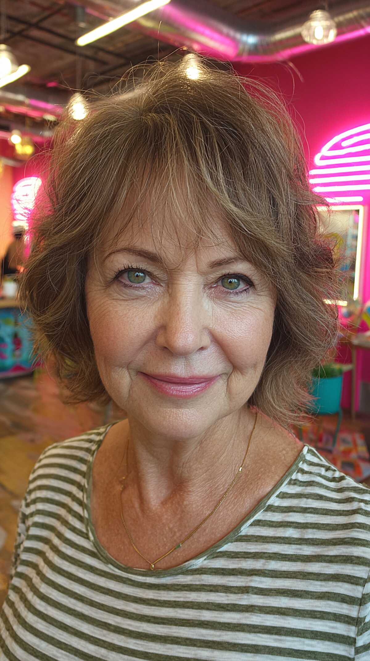 Curly brunette shaggy bob with textured bangs