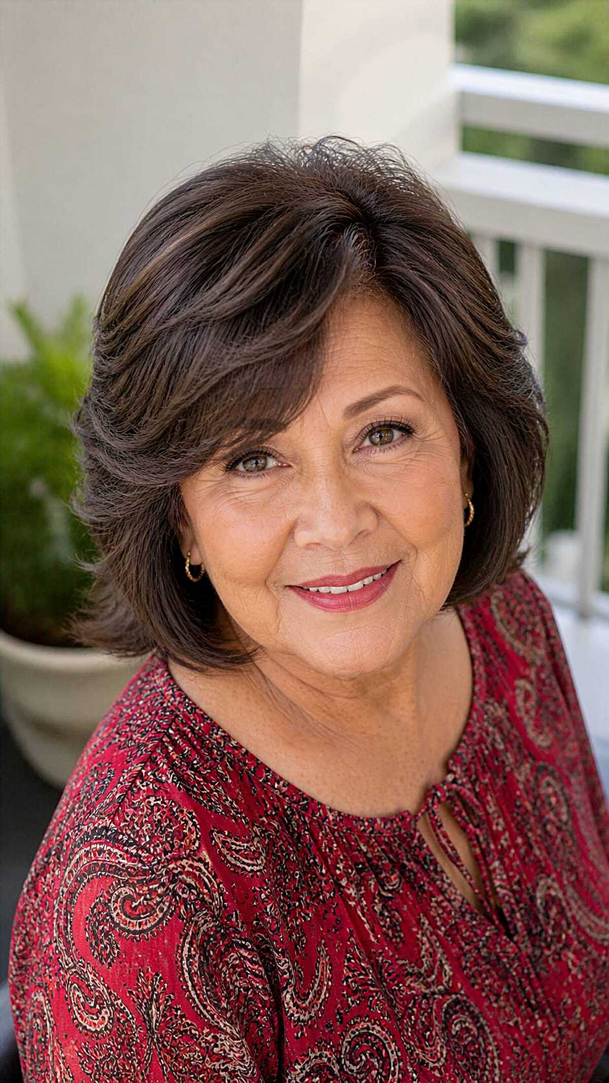 Deep brunette shaggy bob with feathered side layers