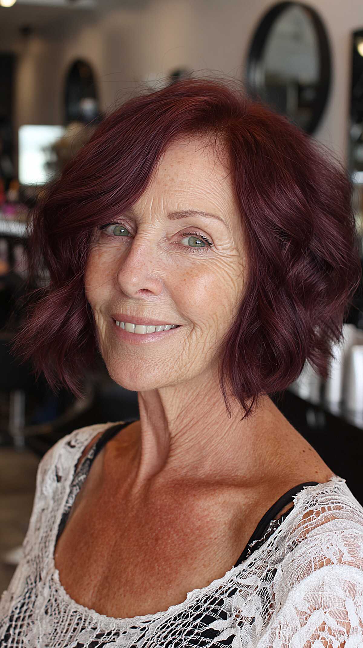 Deep plum wavy shaggy bob on mature woman
