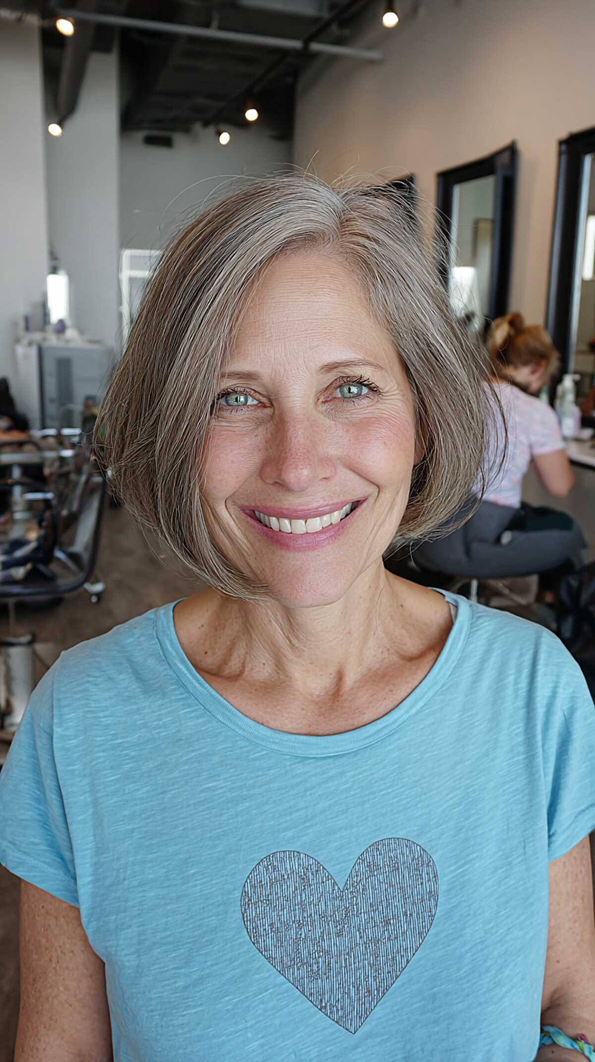 Lived-in gray shaggy bob with natural wave and movement