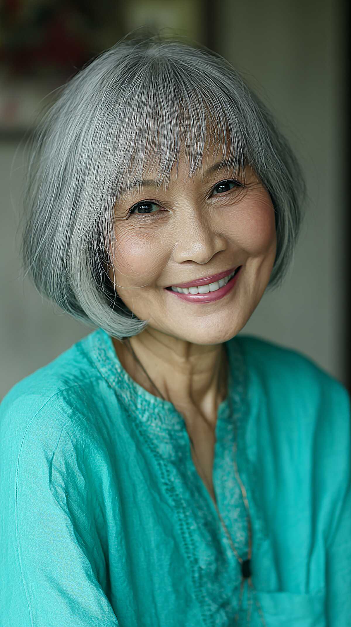 Silver Gray Rounded Bob with Wispy Thin Bangs