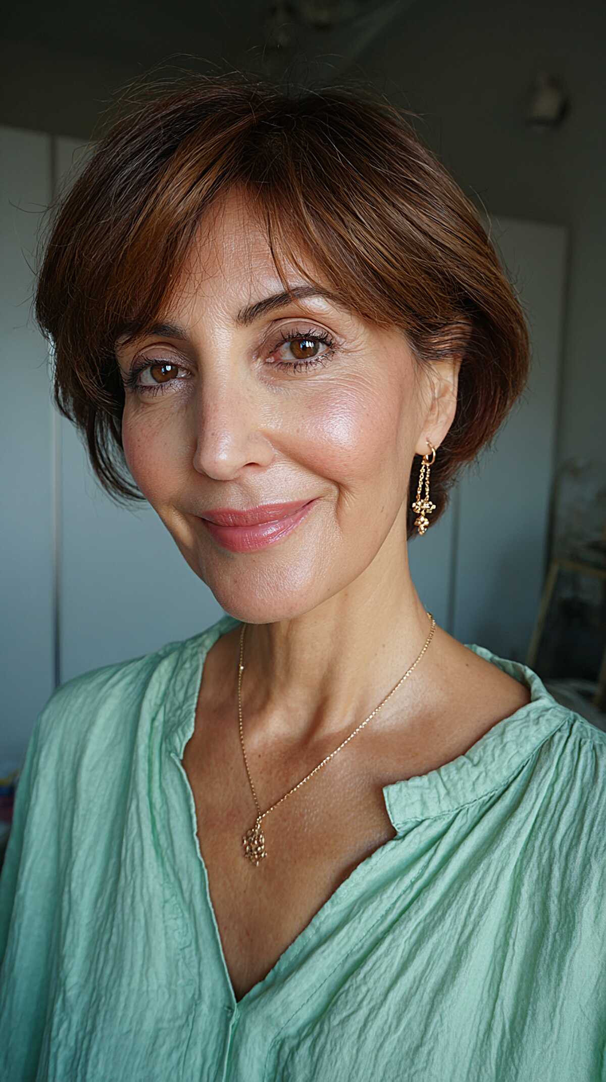 Soft Brunette Crop with Wispy Brow-Grazing Fringe