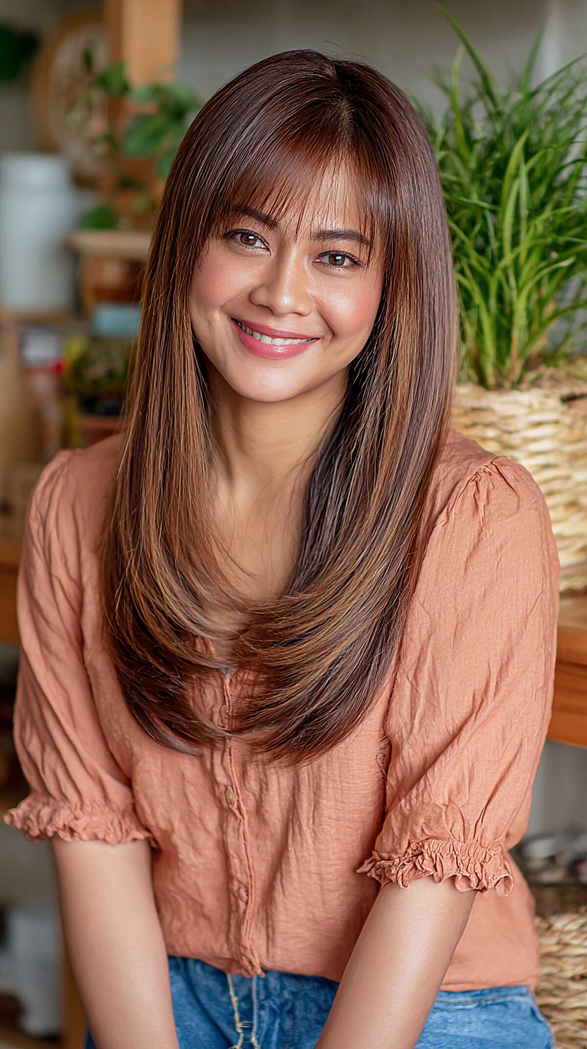 Wispy Bangs with Long Feathered Layers in Warm Chocolate
