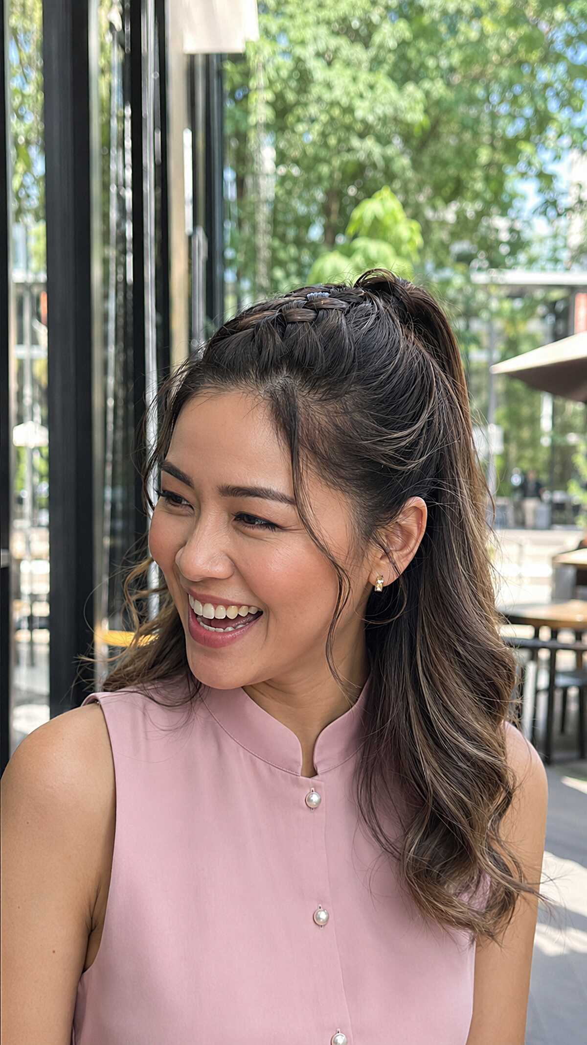 Braided headband ponytail with curtain bangs and curled ends
