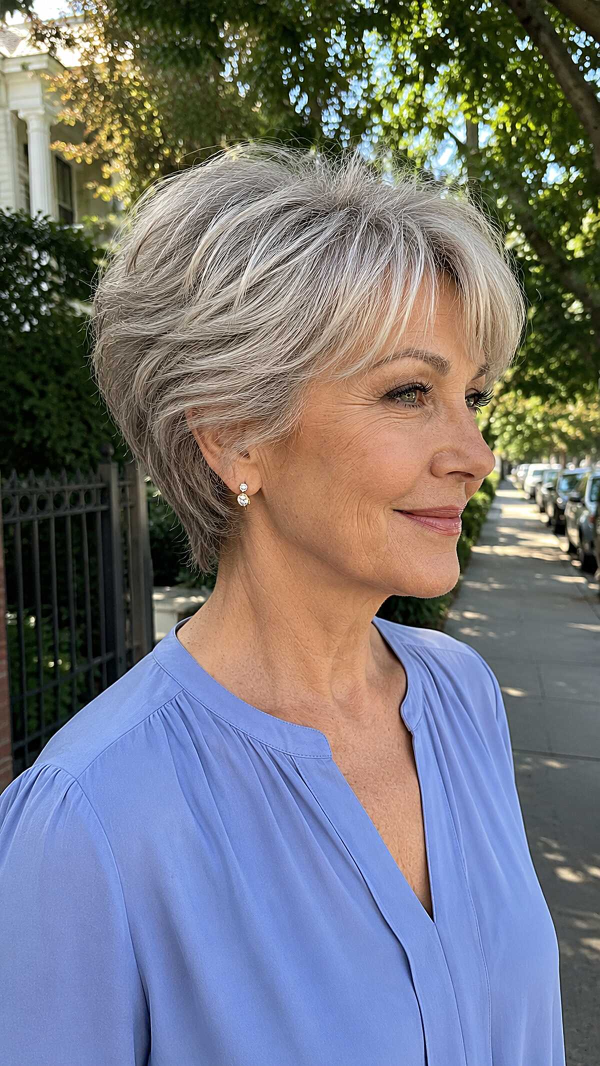 Short silver layered cut with feathered nape and sides