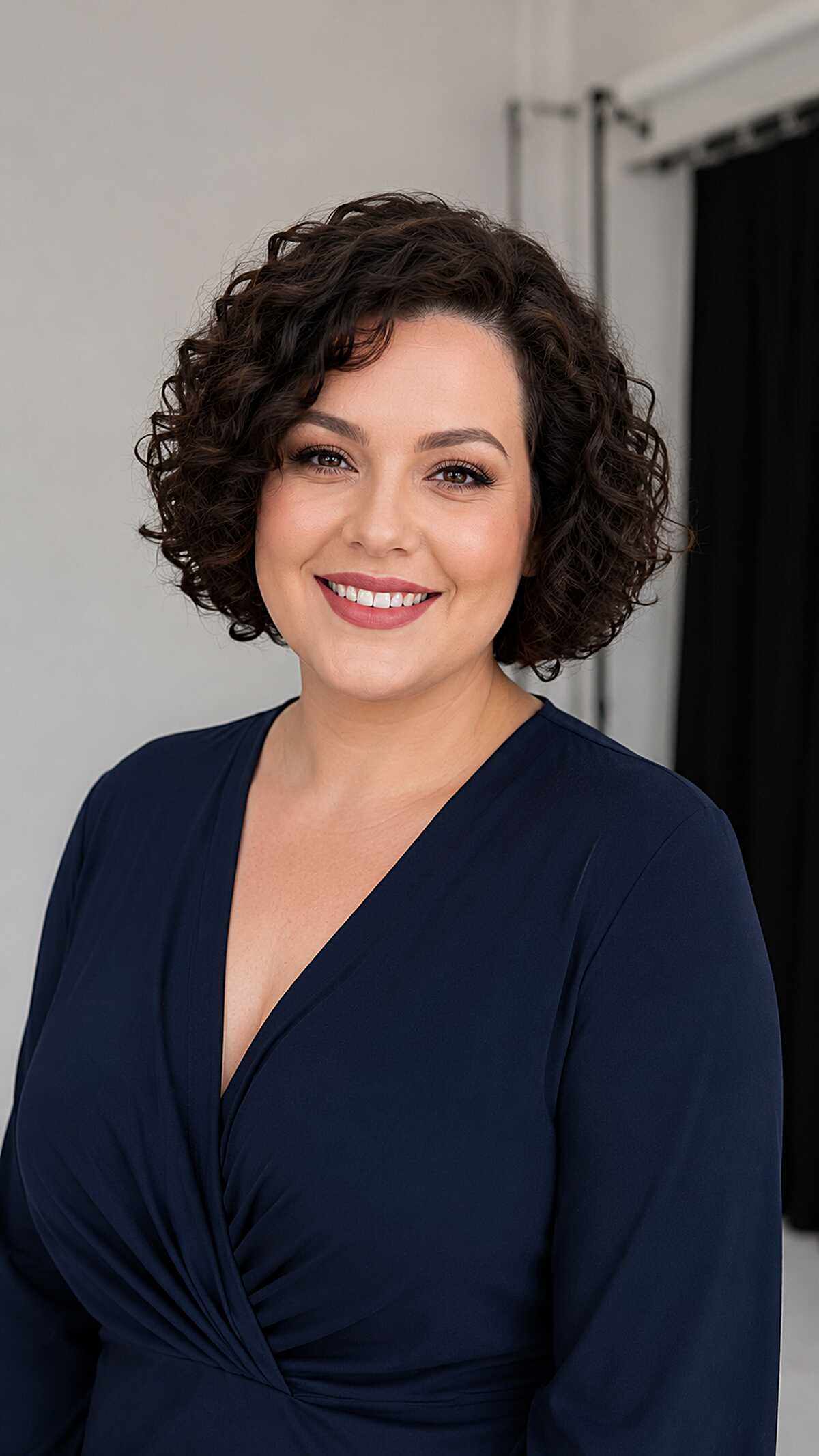 Short curly brunette bob with defined bouncy ringlets