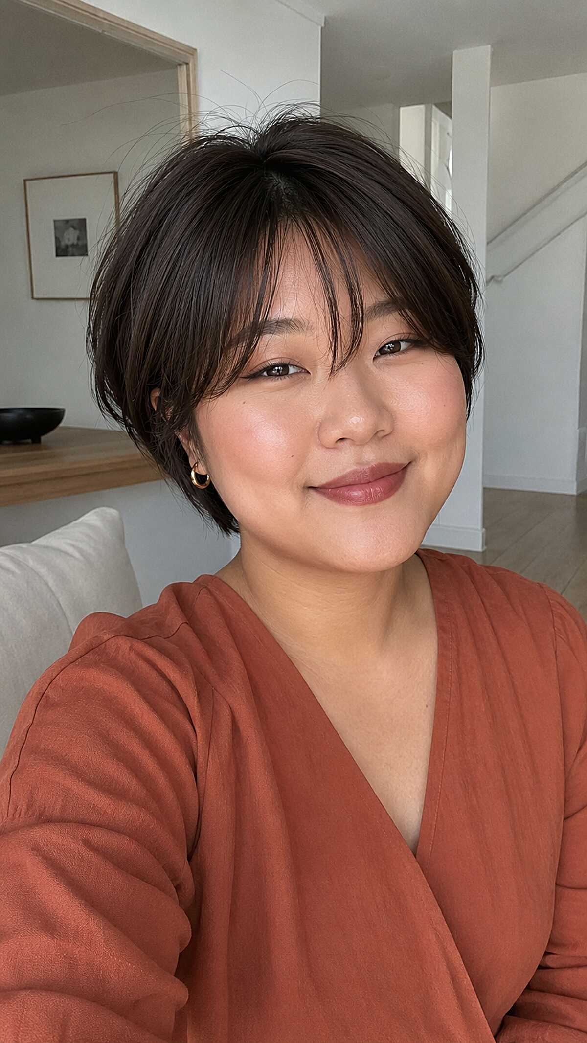 Soft textured black ear-skimming bob with fringe