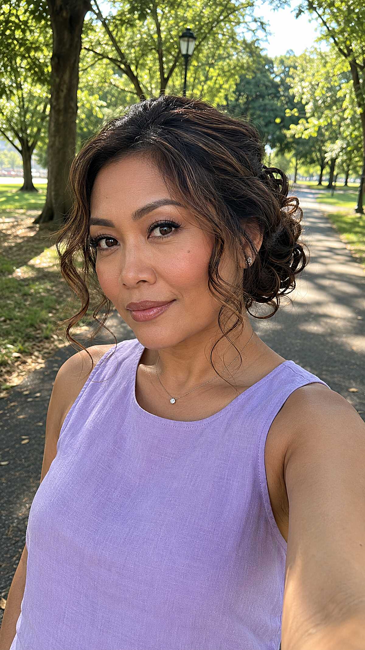 Low Pinned Curls with Warm Brunette Dimension