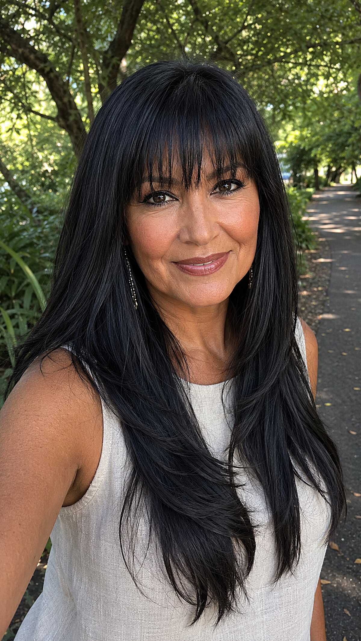 Razored Black Layers with Full Textured Bangs
