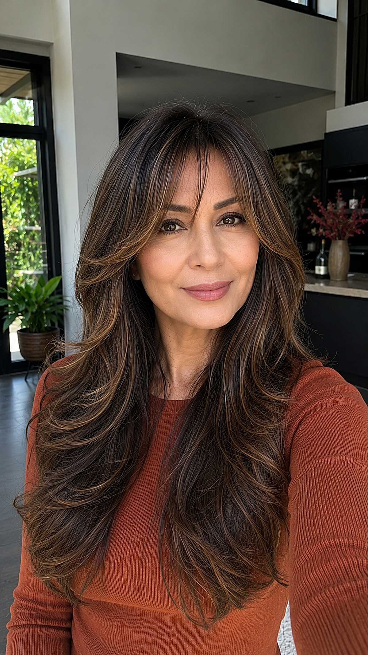 Rich Brunette with Toffee Highlights and Long Swooping Fringe