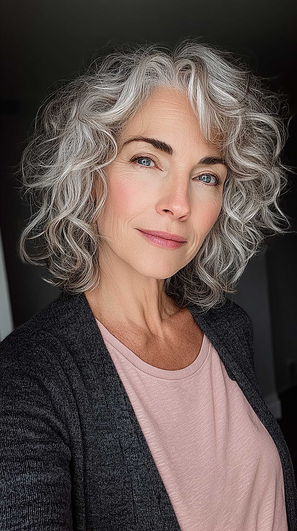 Silver-Streaked Curly Bob with Warm Brunette Depth