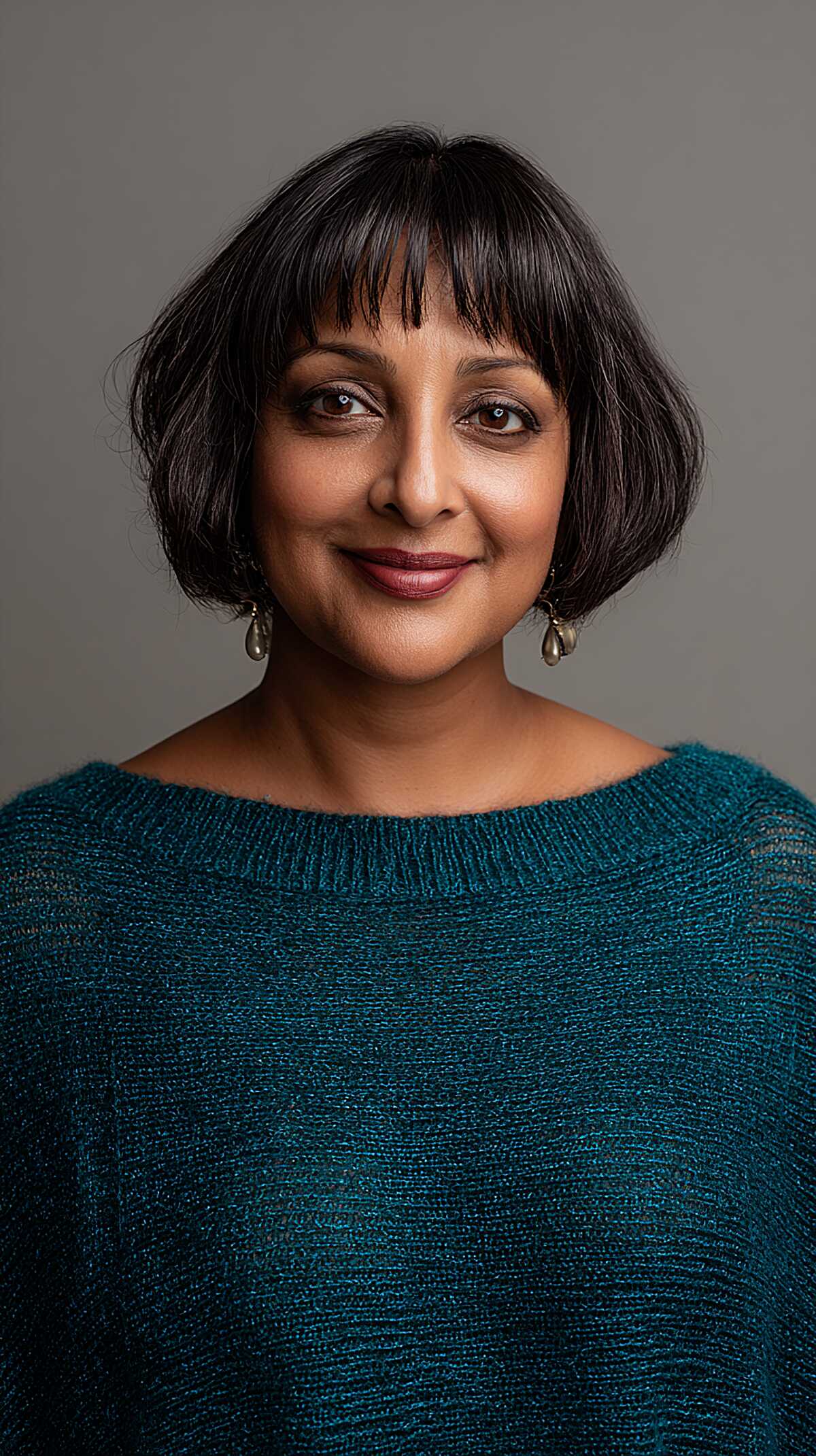 Soft Rounded Bob with Wispy Bangs in Natural Dark Brown