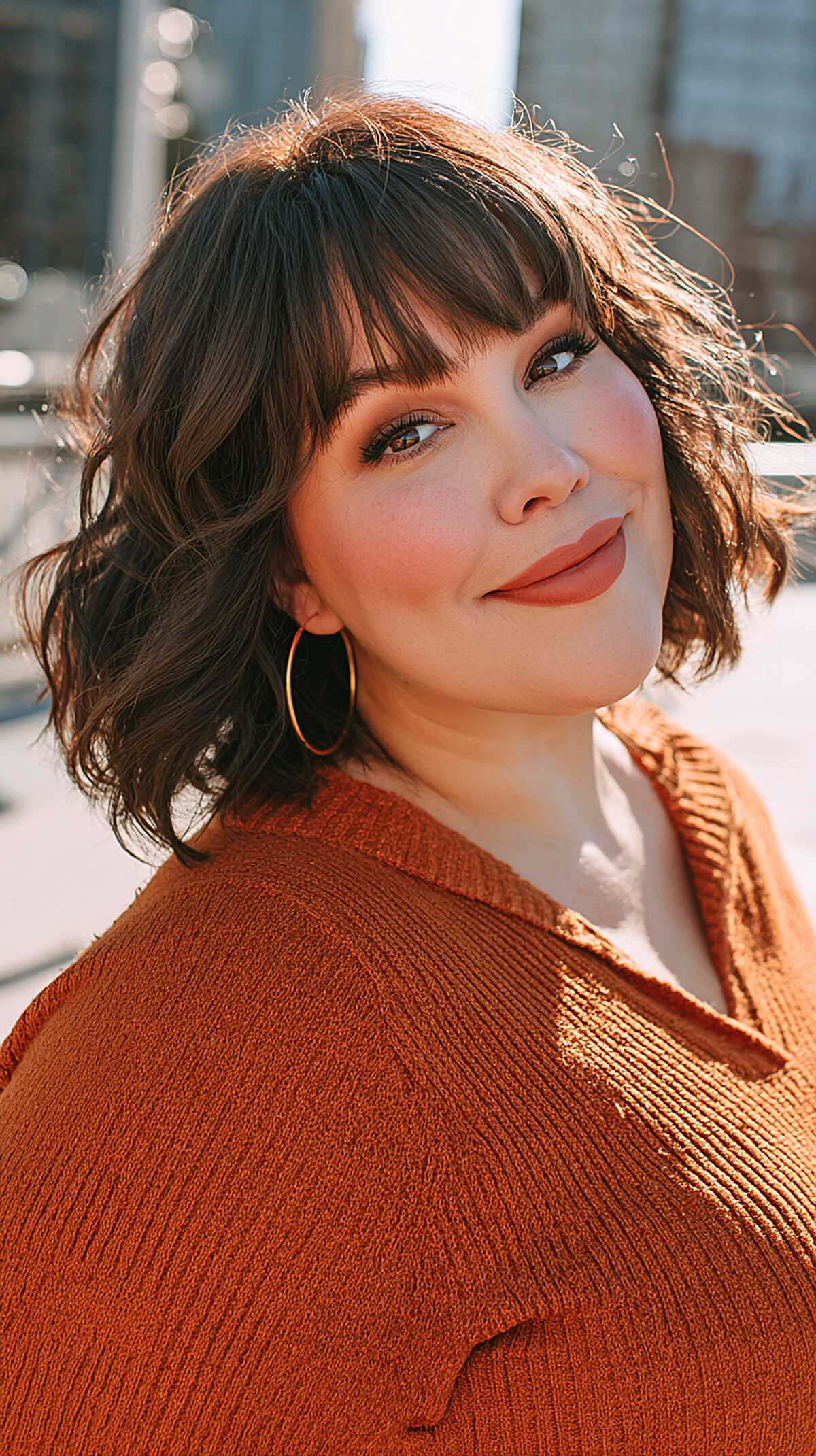 Tousled Chin-Length Bob with Soft Arched Bangs in Rich Brunette