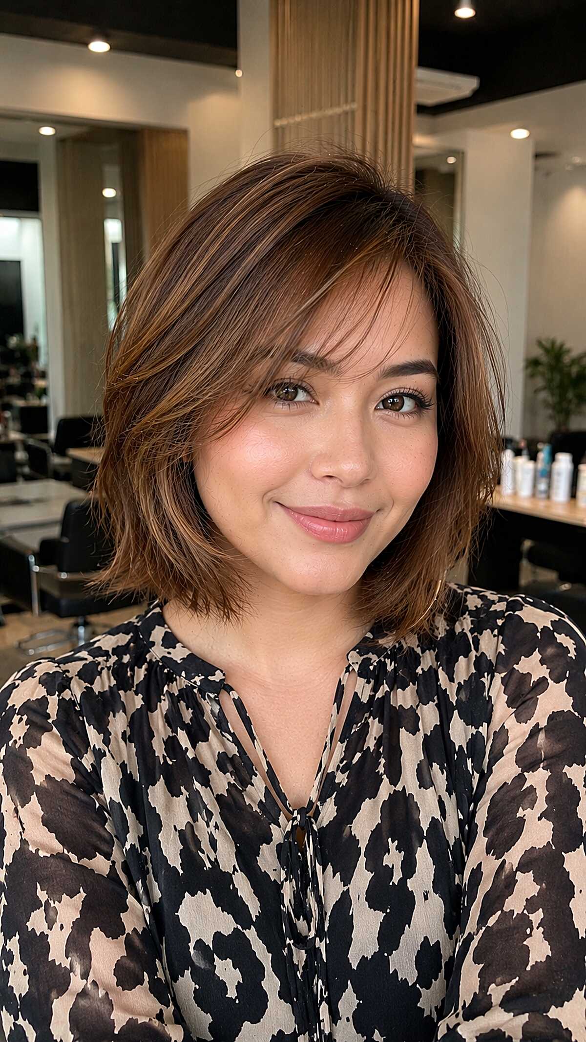 Caramel brown chin-length bob with soft side bangs