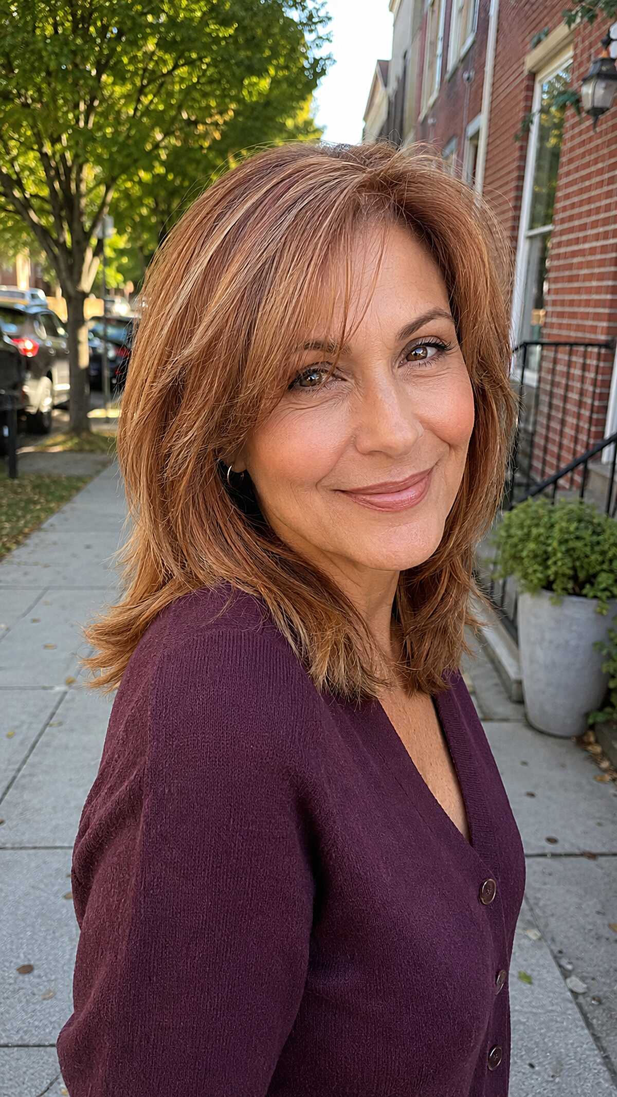 Shoulder-Length Copper with Face-Framing Pieces on Medium-Warm Skin