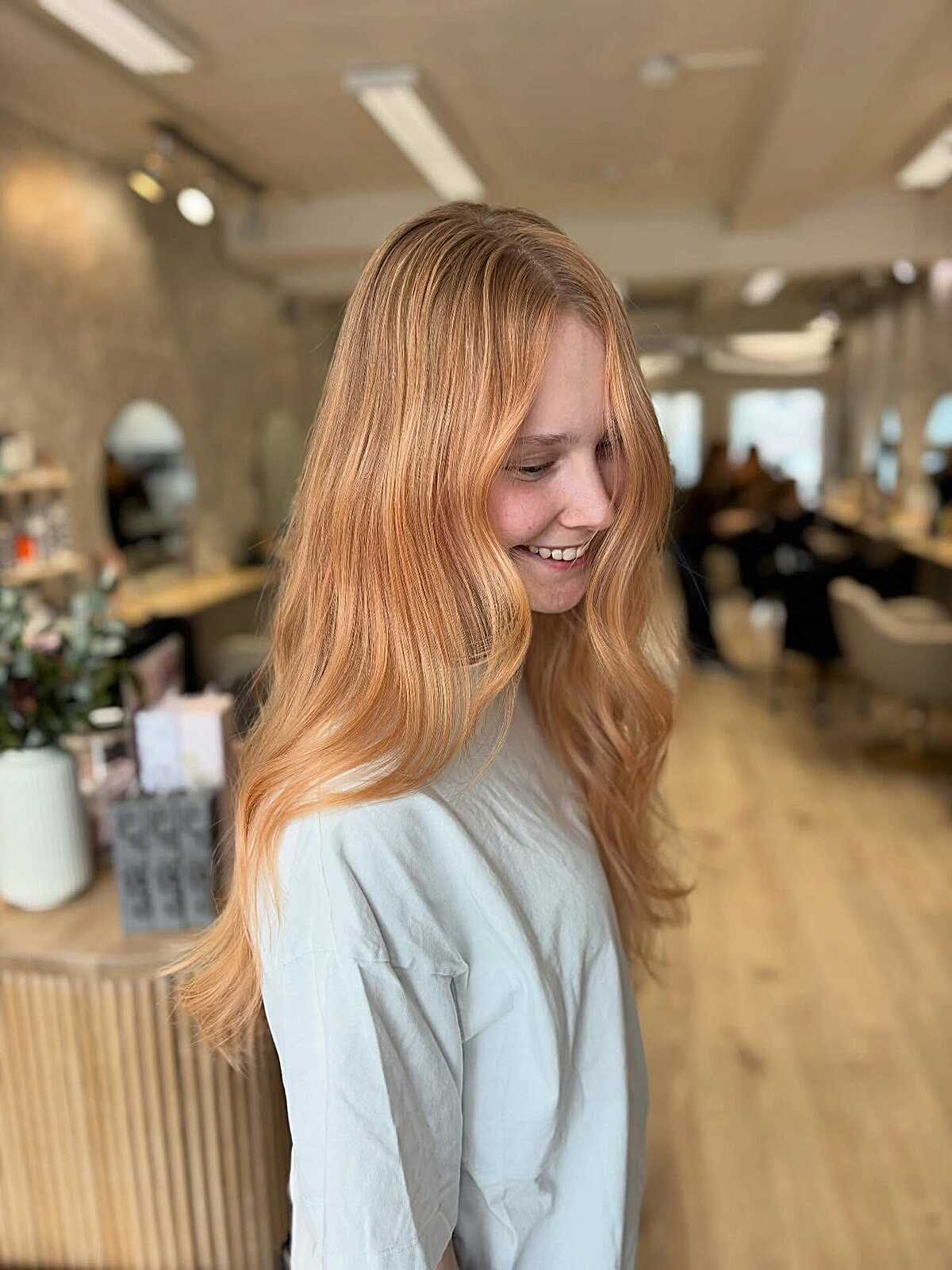 Soft Peach Copper on Long, Fine Hair with Loose Waves