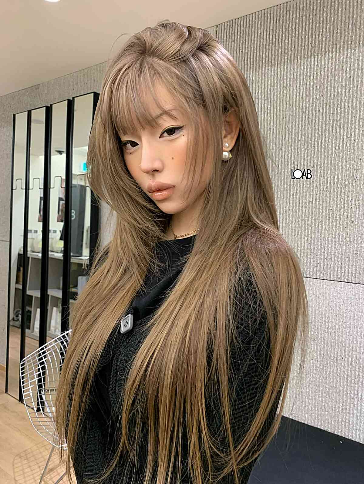 Long Hair with Front Layers and Wispy Bangs