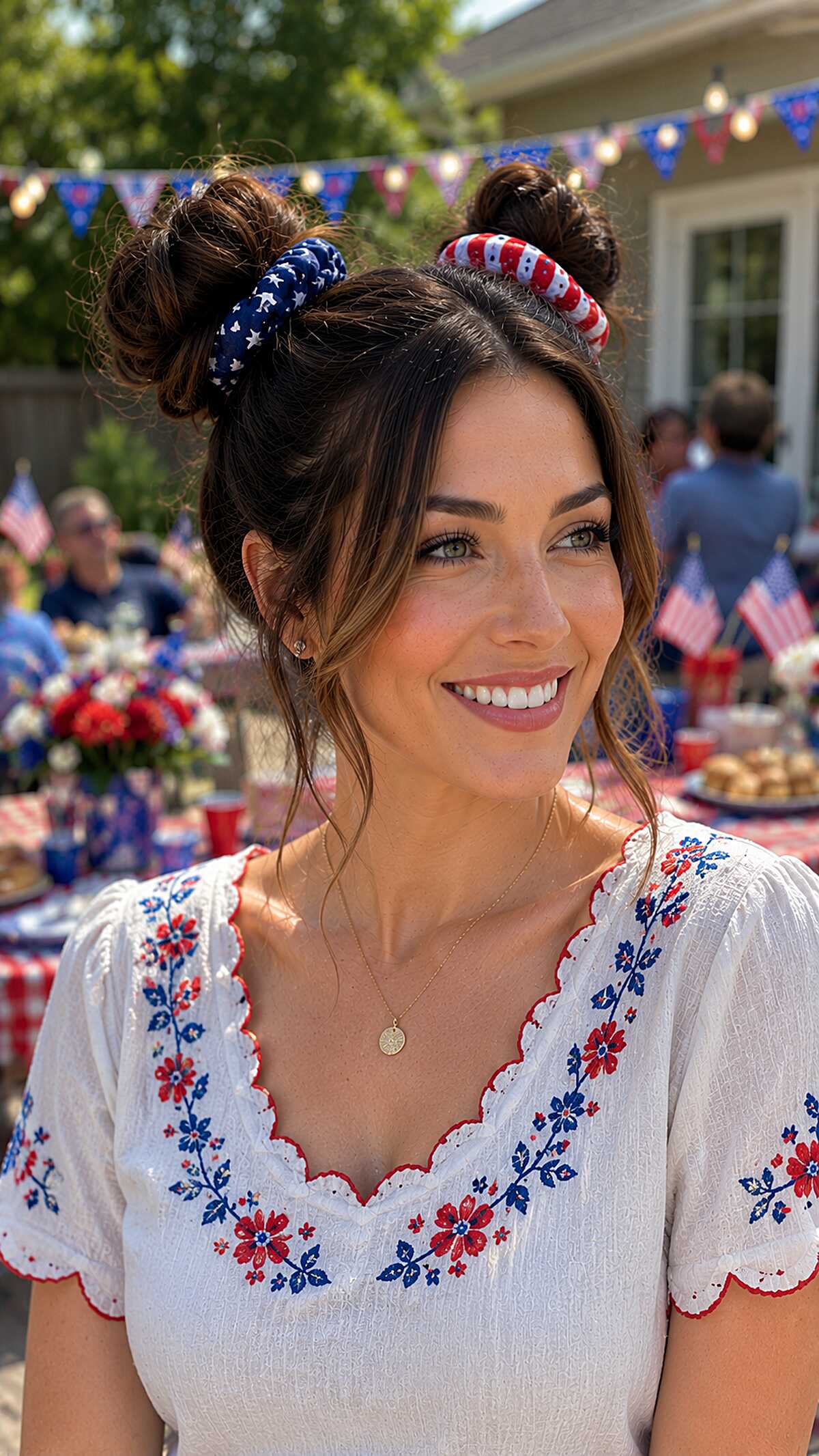 Double buns with stars and stripes scrunchies at base