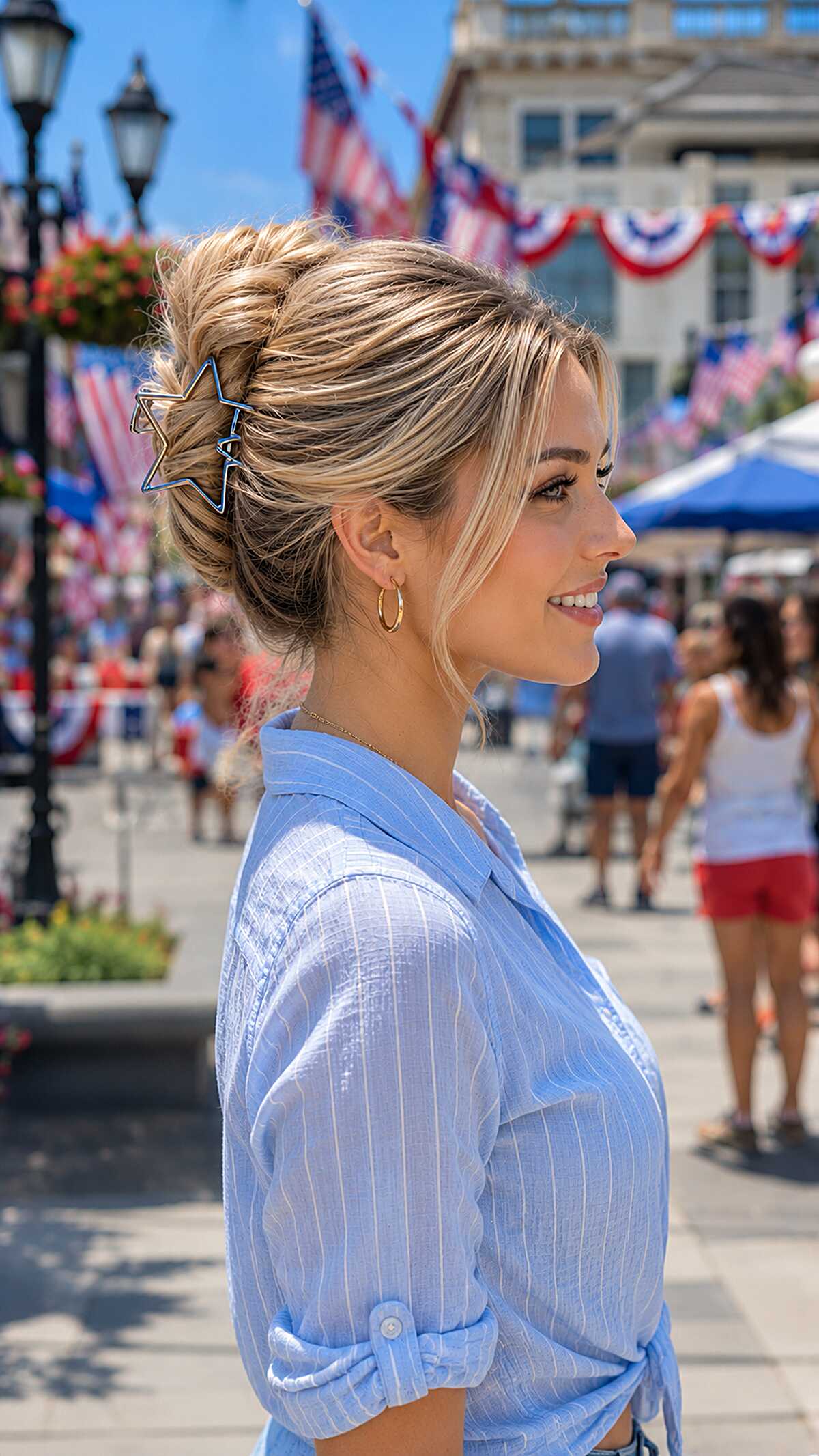 Blonde twisted French twist updo with star claw clip