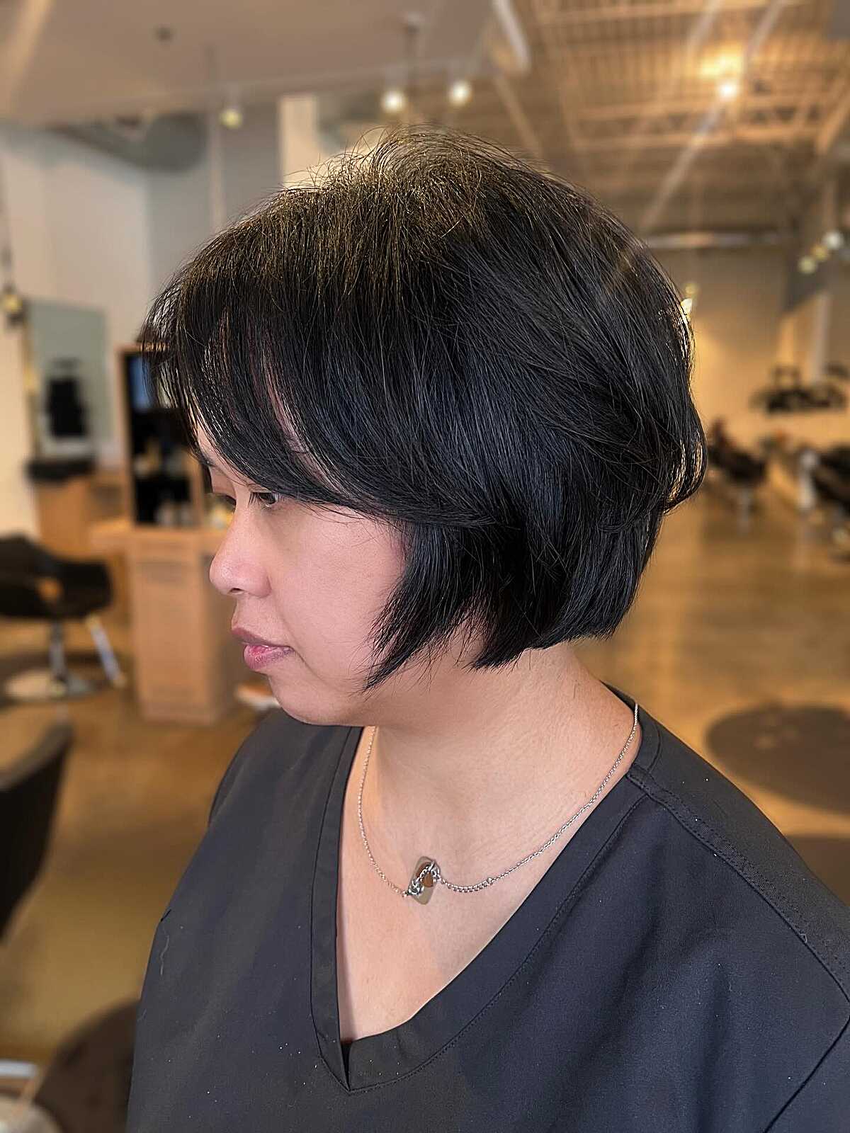 Classic black rounded bixie with layered side fringe