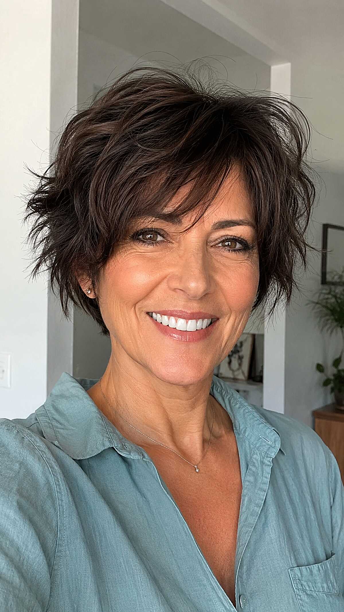 Voluminous dark espresso bixie with dramatic sweep