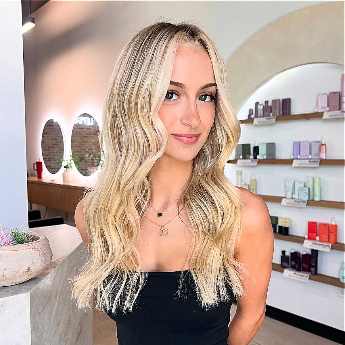 Long bright blonde hair with loose beachy waves