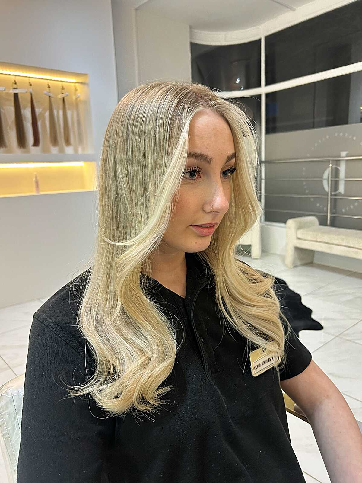 Long champagne blonde hair with seamless layered ends