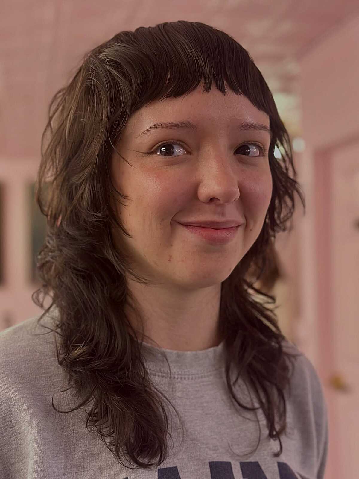 Long dark wavy shag with micro bangs