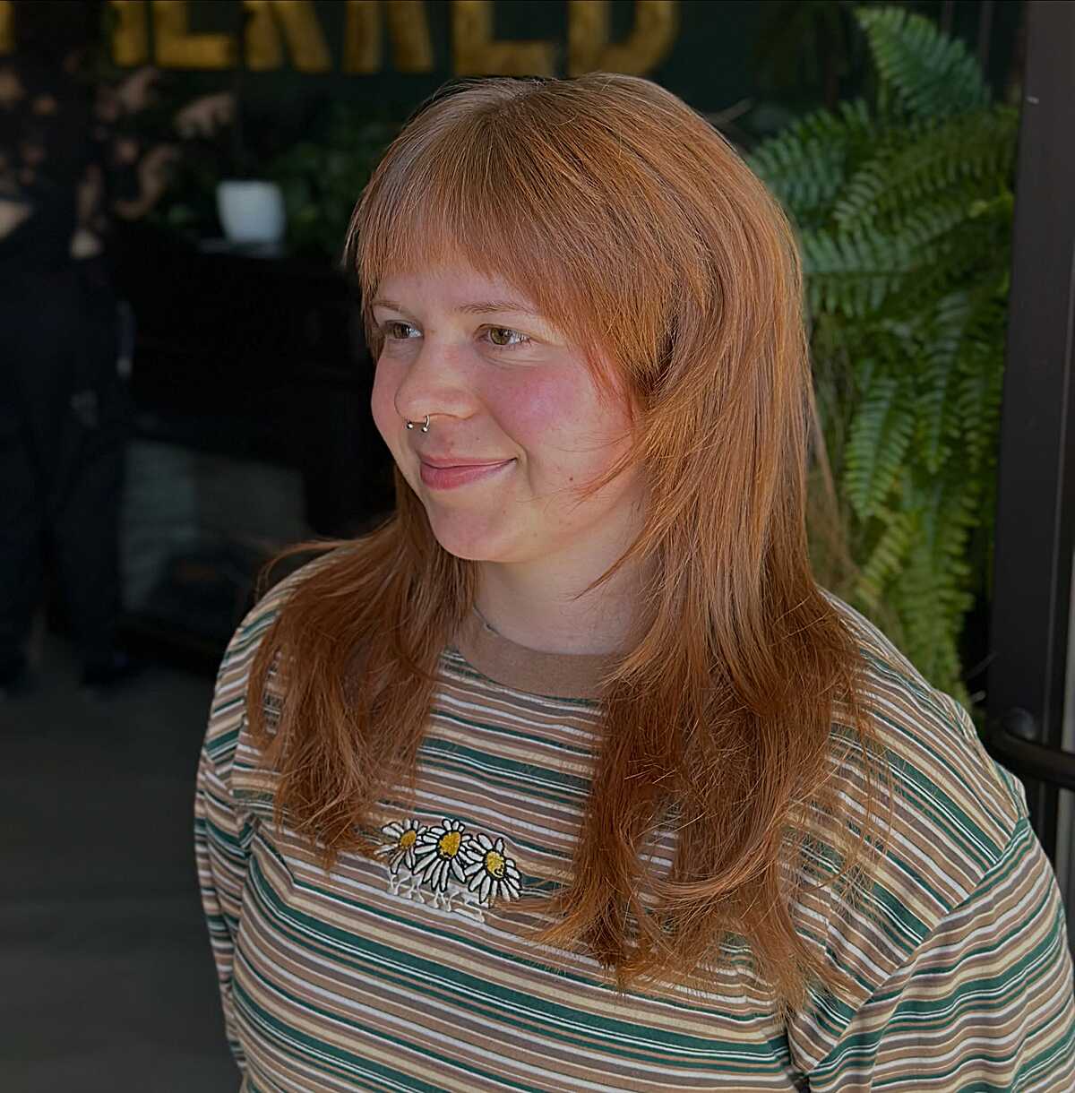 Long ginger copper shag with soft bangs and layers