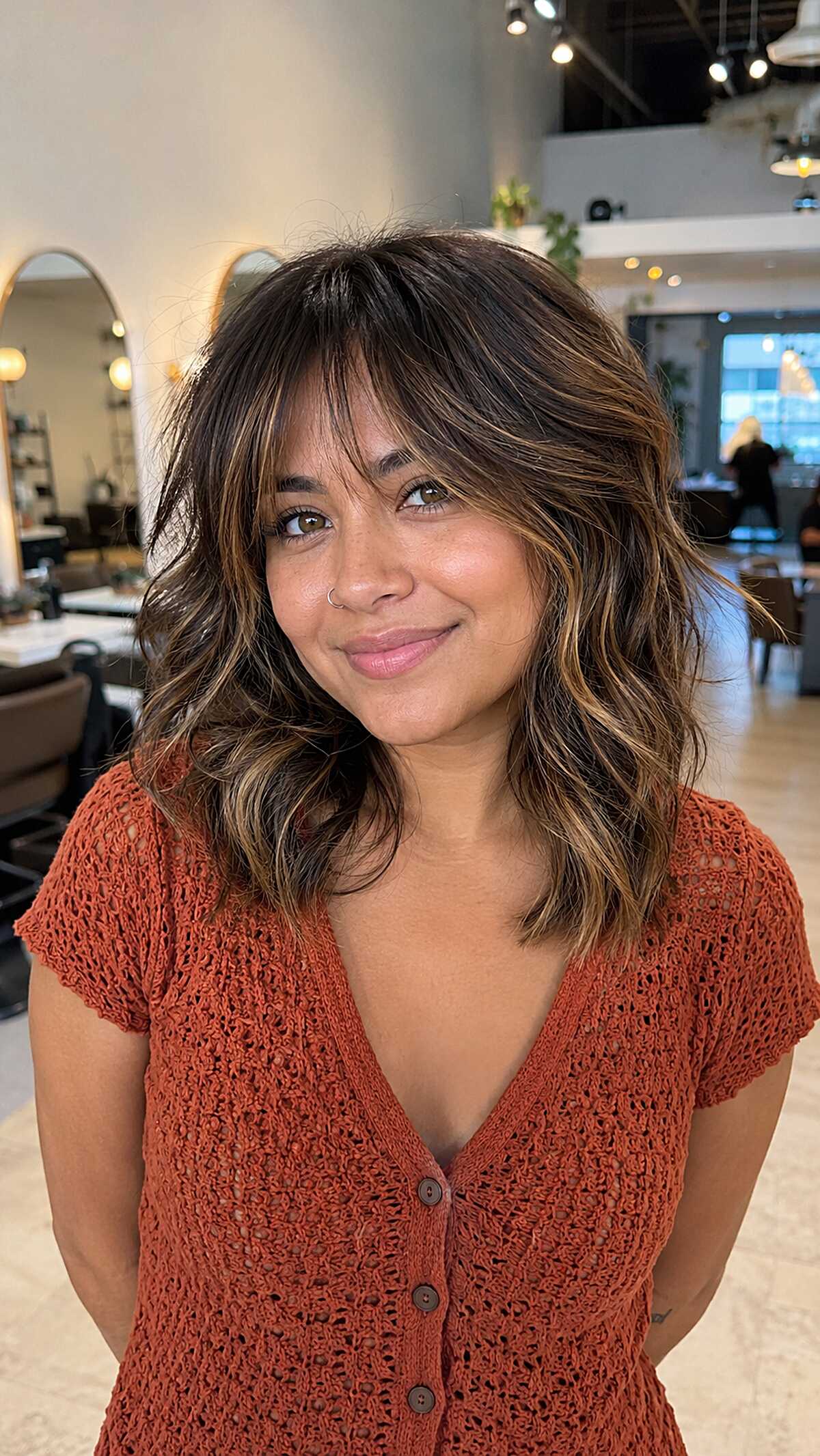 Shaggy Honey Balayage with Curtain Bangs on a Dark Root