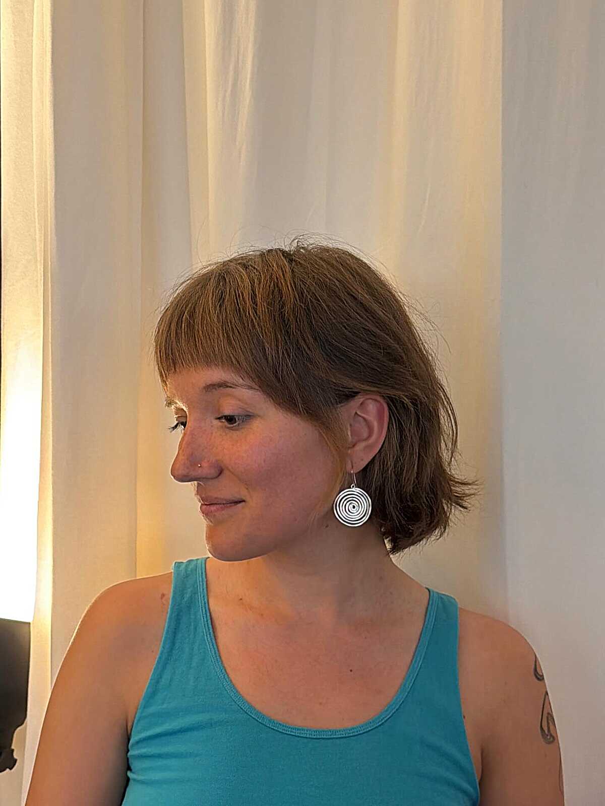 Chin-length brunette shag bob with short bangs