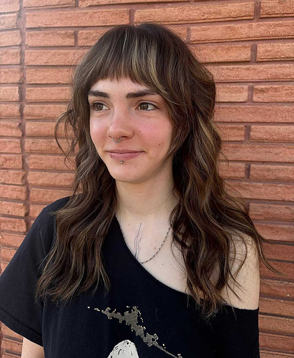 Long wavy brunette shag with highlighted face framers