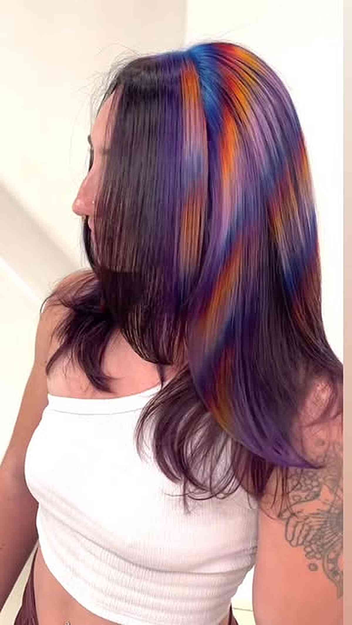 Vibrant Blue and Orange Ribbon Highlights on Long Straight Hair