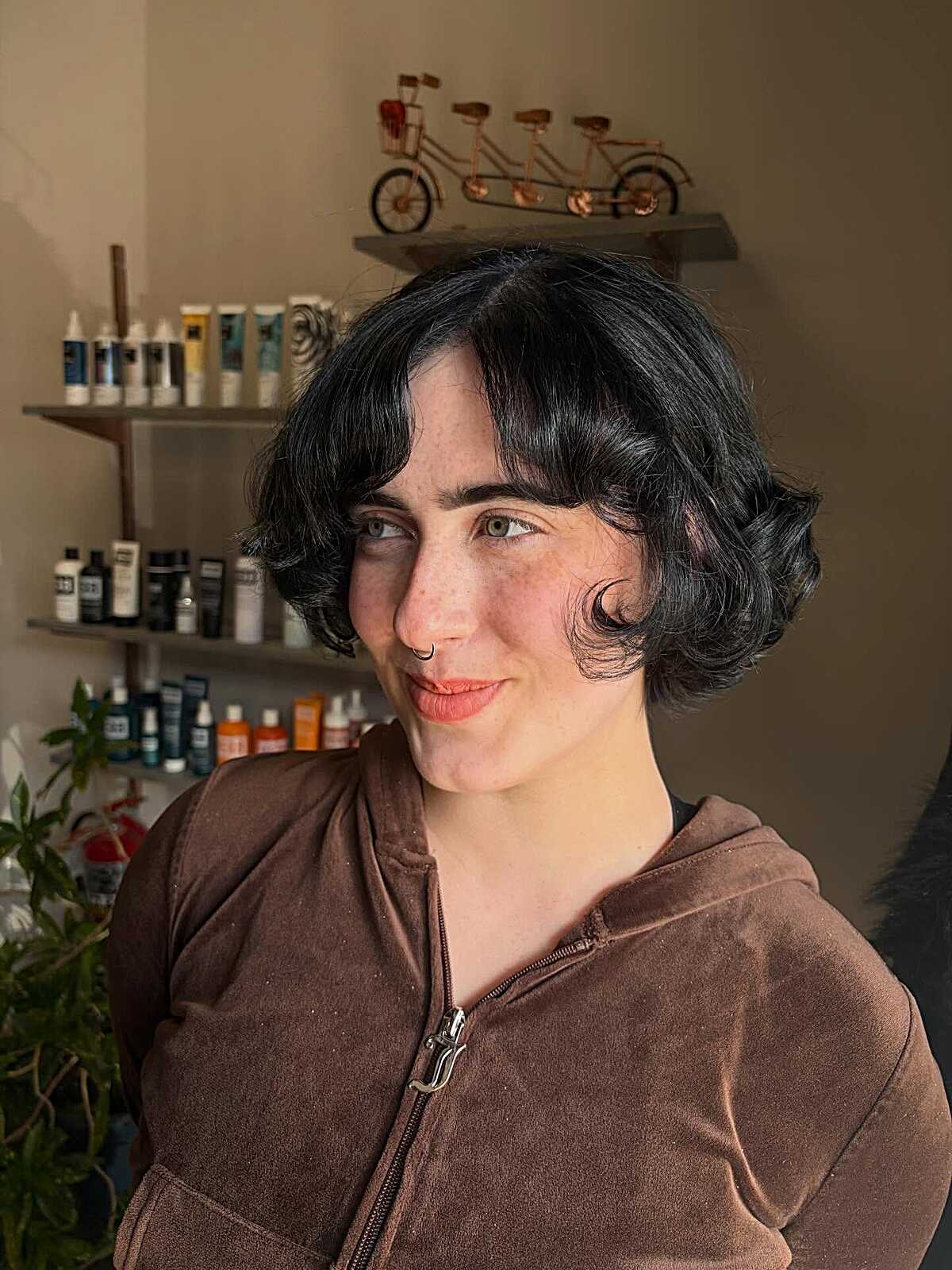 Short wavy black bob with vintage finger wave style