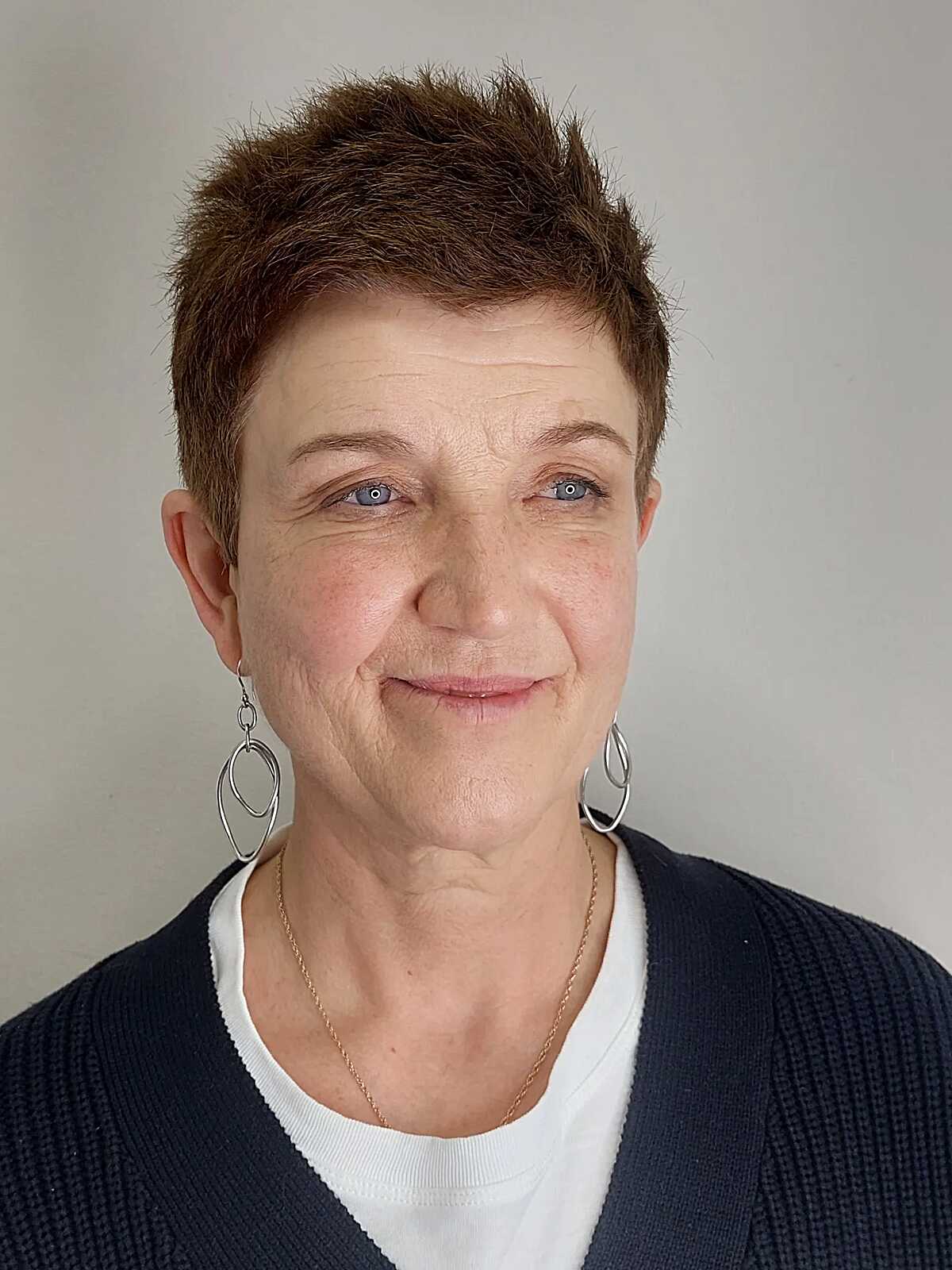 Very short brunette textured pixie with spiky top