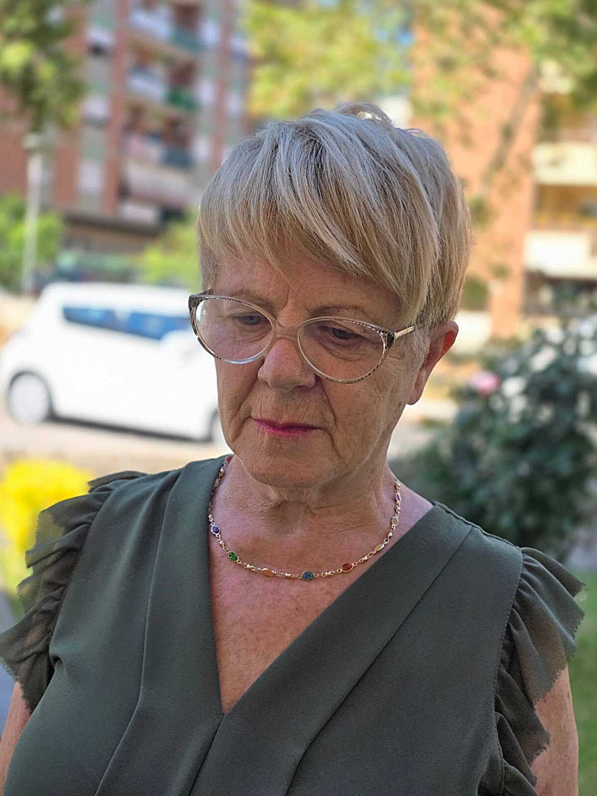 Classic blonde pixie with soft fringe on older woman