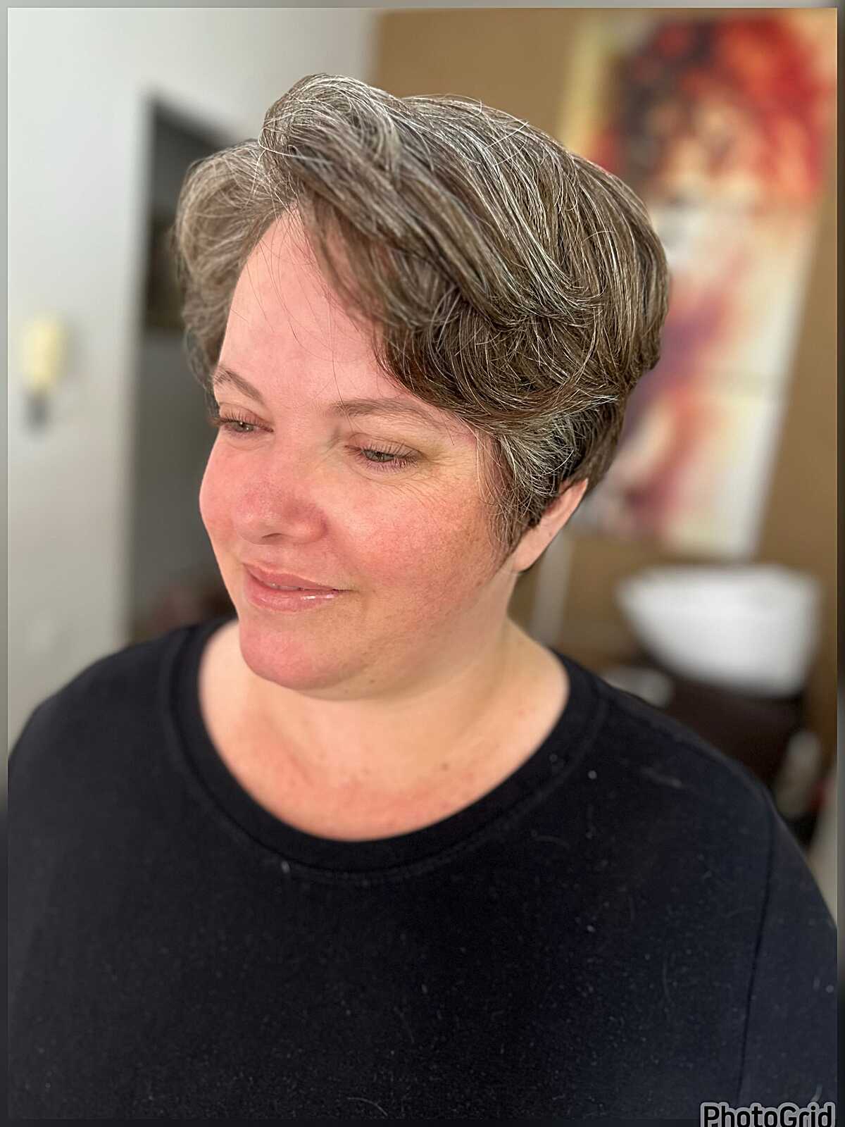 Polished gray side-swept pixie with volume on top