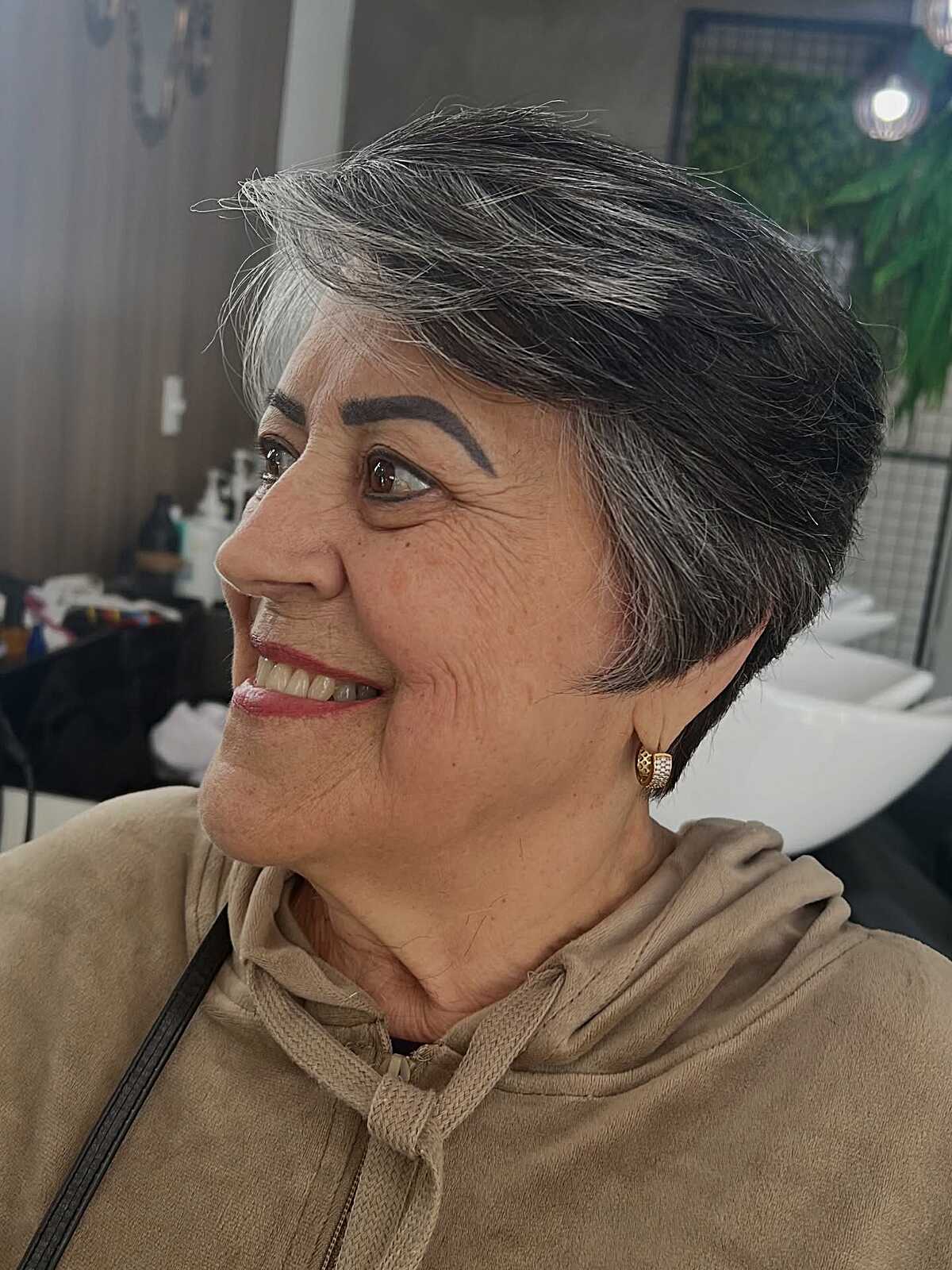 Salt and pepper short pixie swept back on grandma