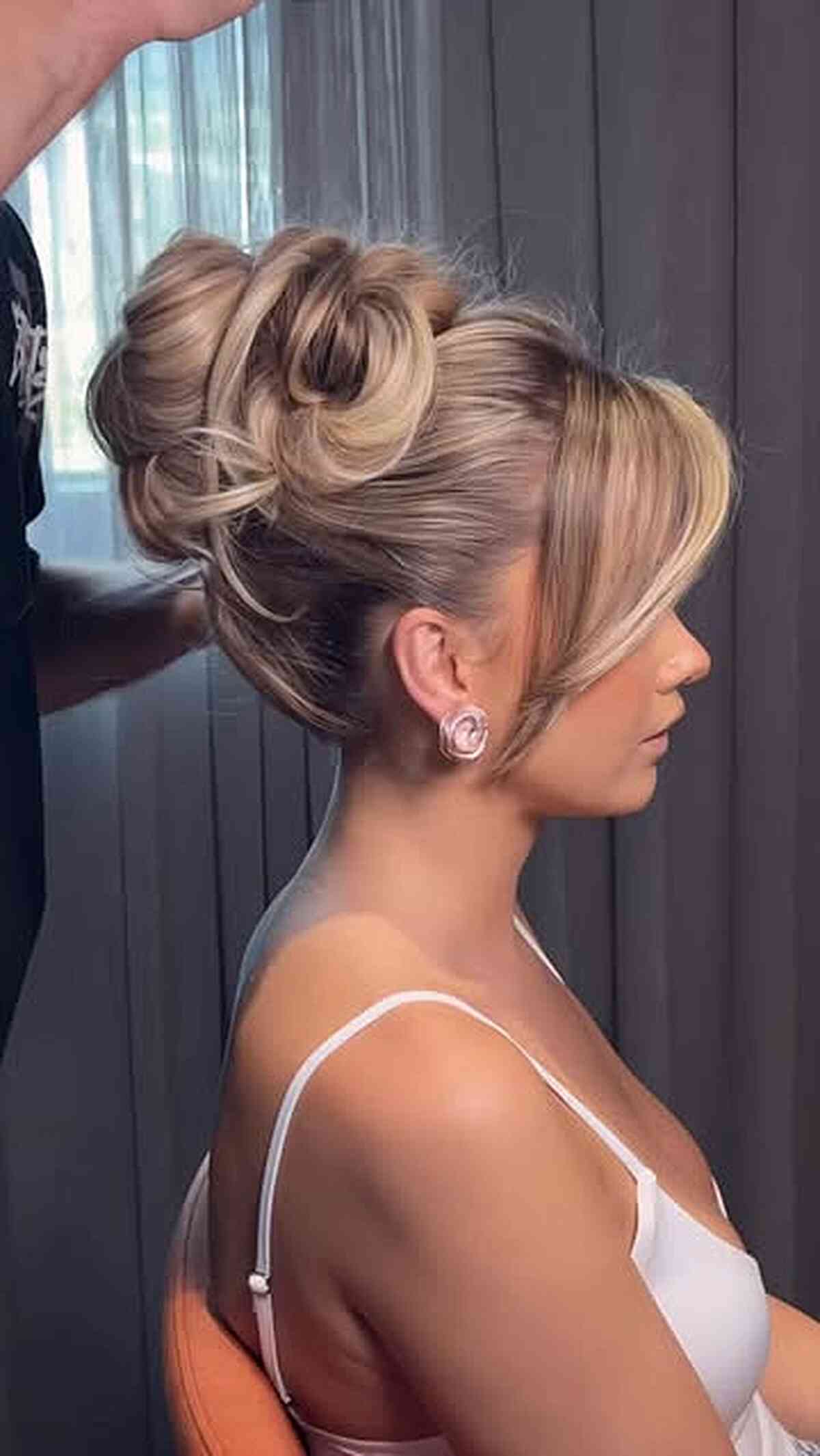 Soft Looped Chignon with Side Bangs